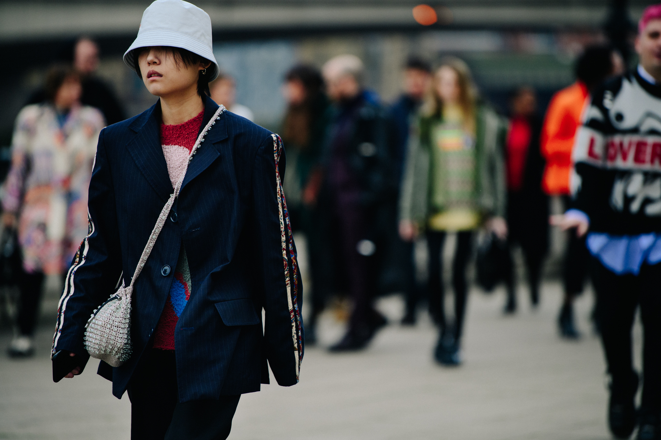 Woman wearing Adidas suit jacket