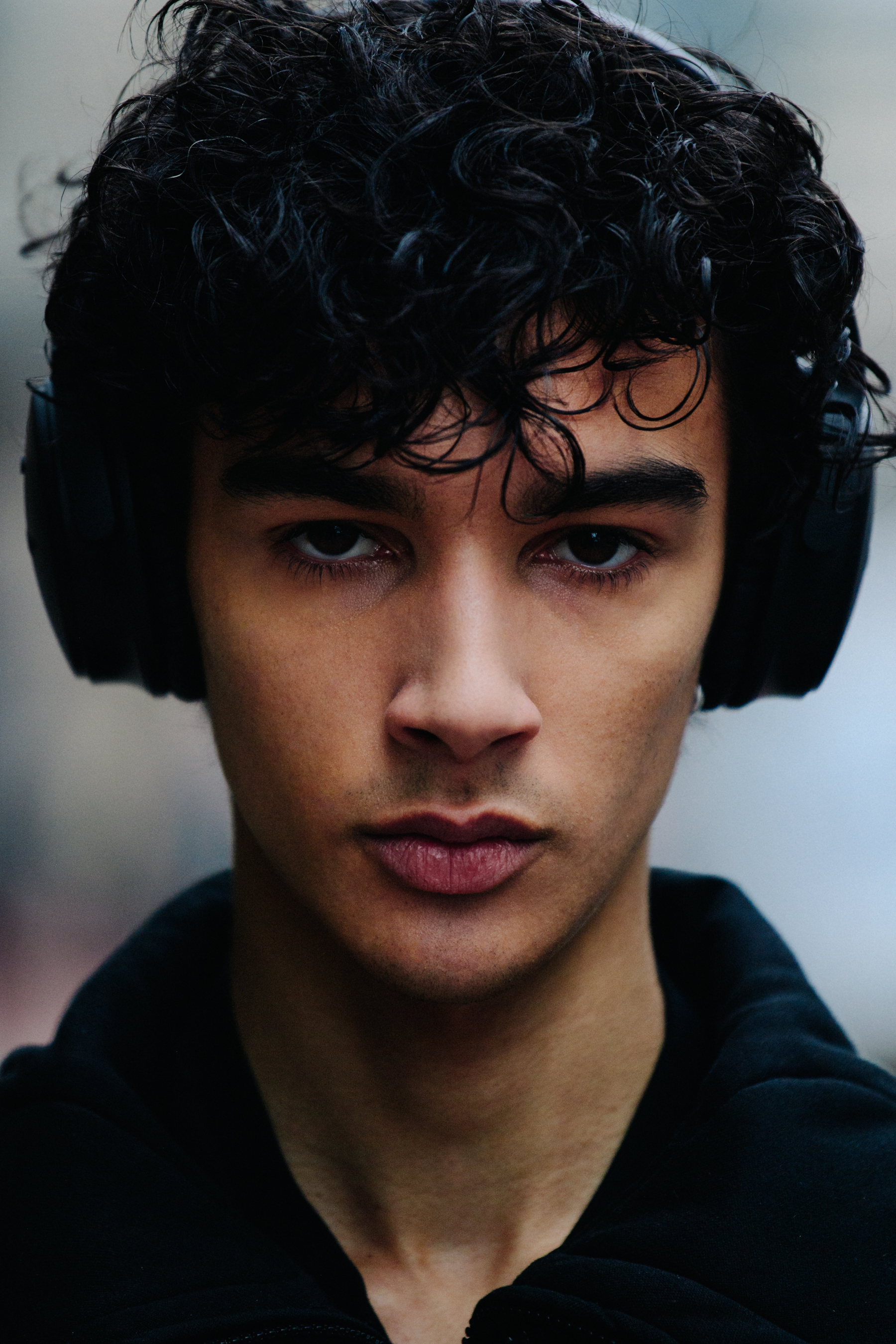 Portrait of model with short curly hair