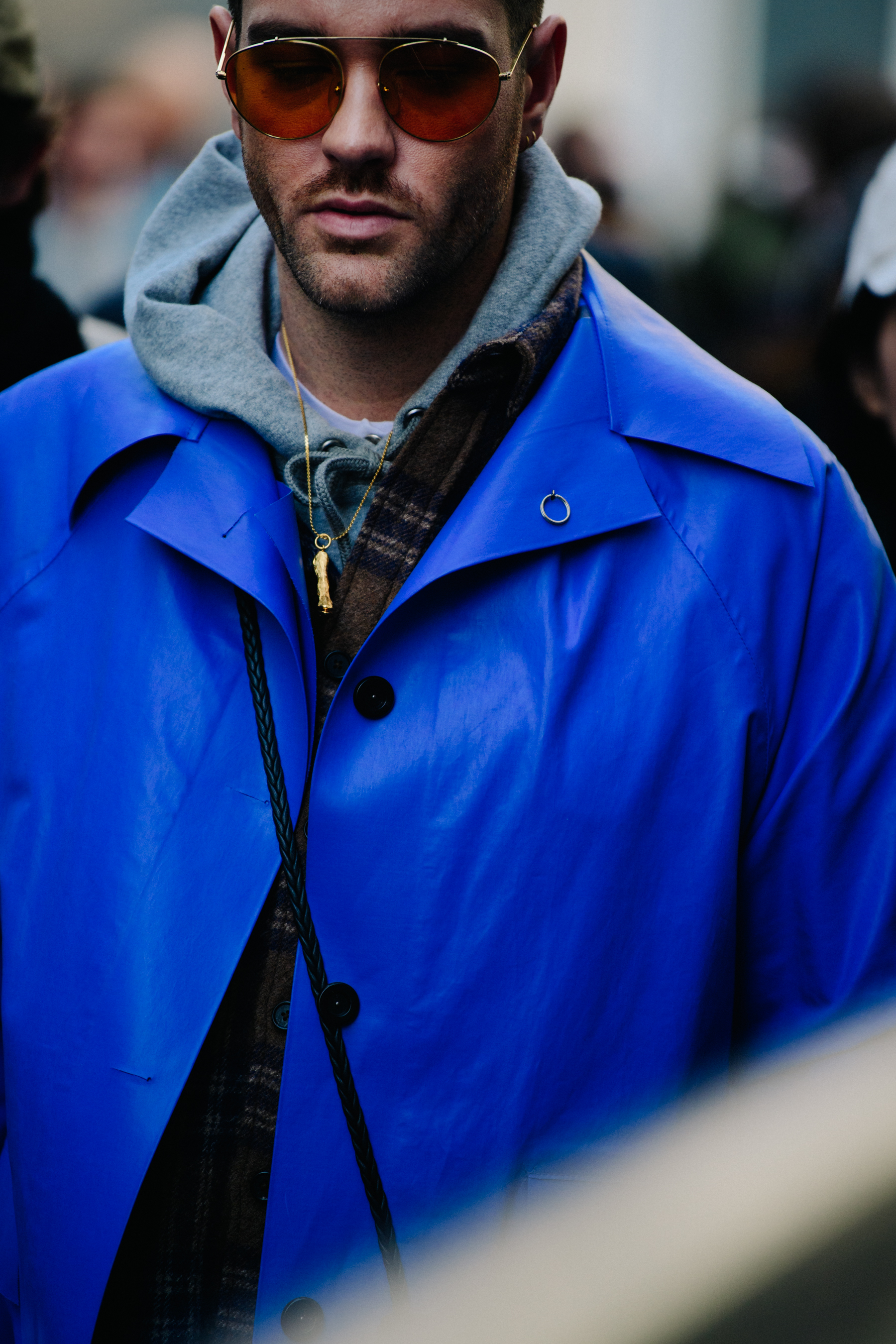 Man wearing blue leather coat