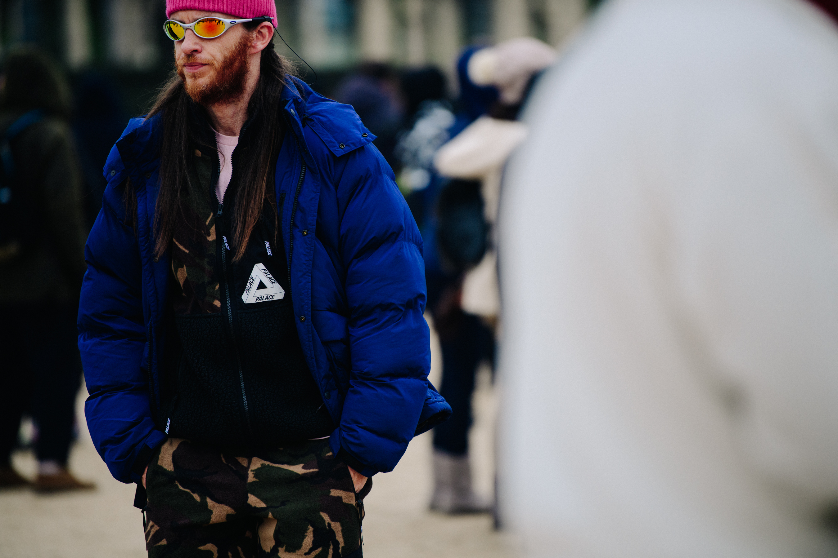 Man wearing pink beanie