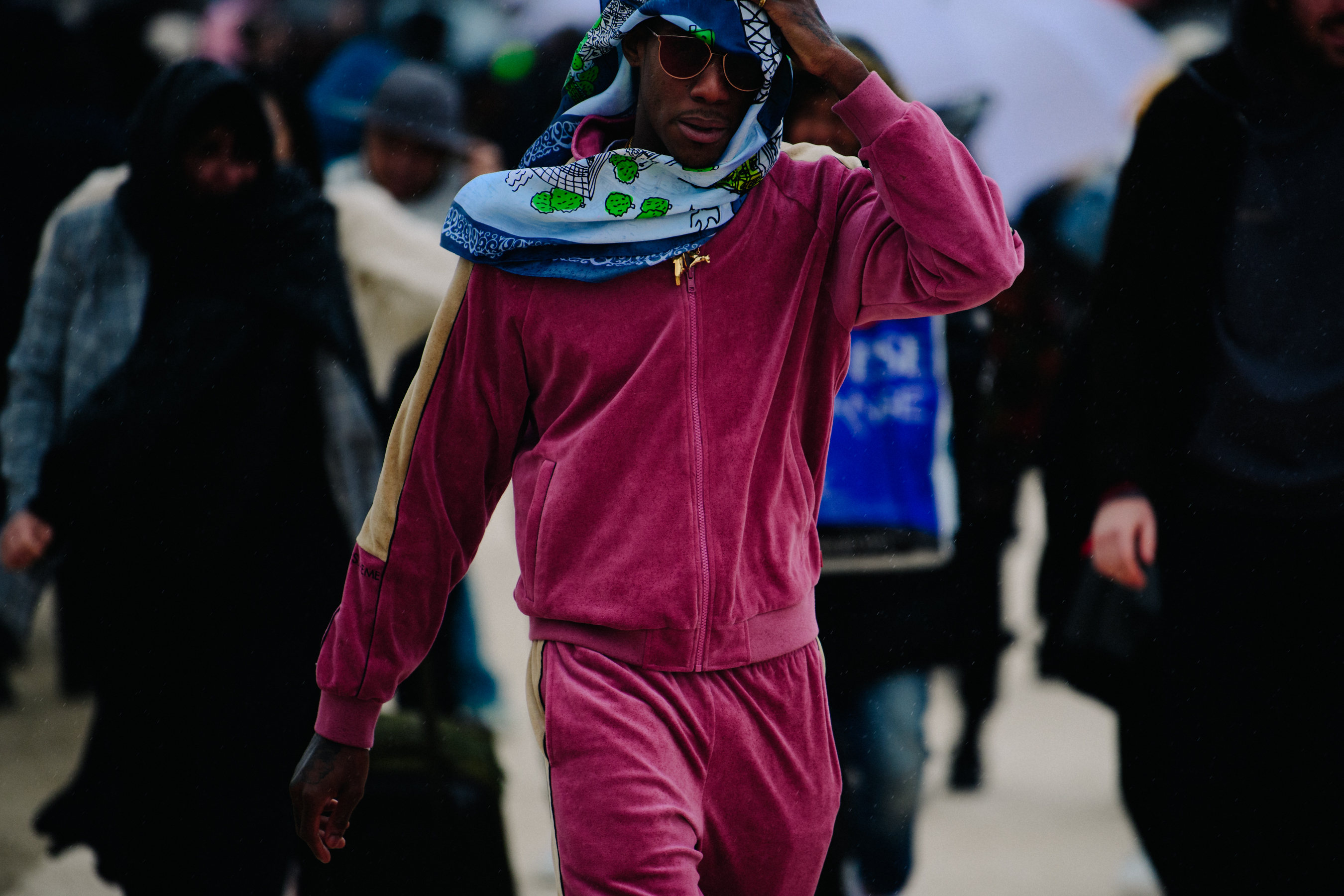 Man wearing pink tracksuit