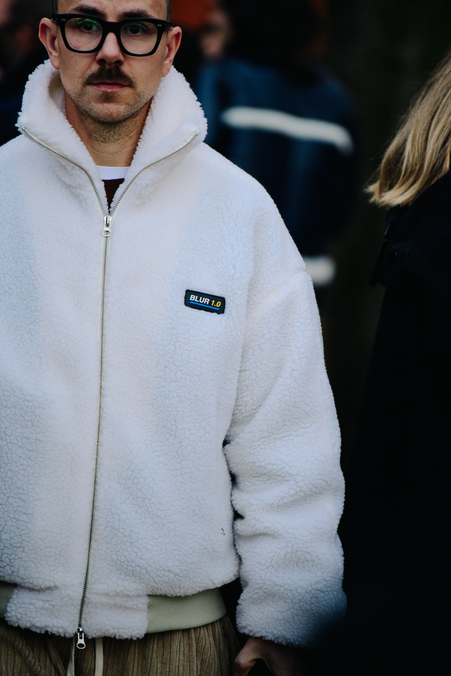 Man wearing white fleece