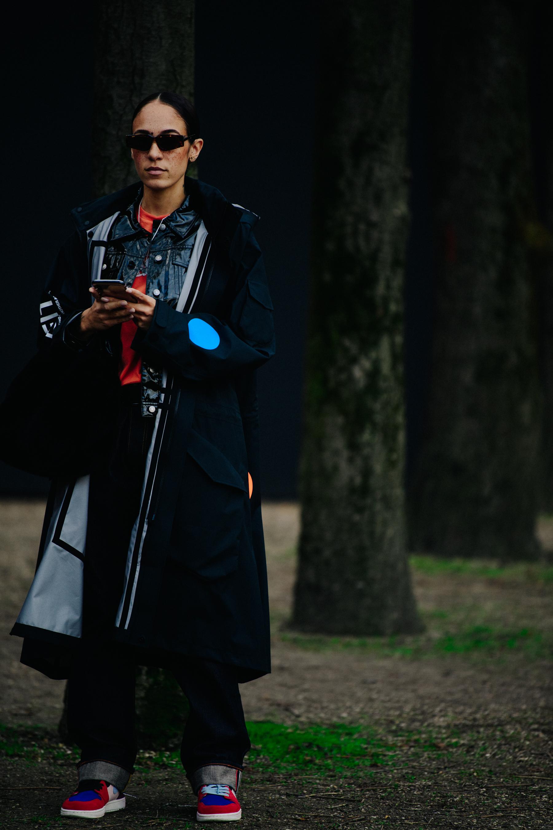 Woman wearing long Nike coat