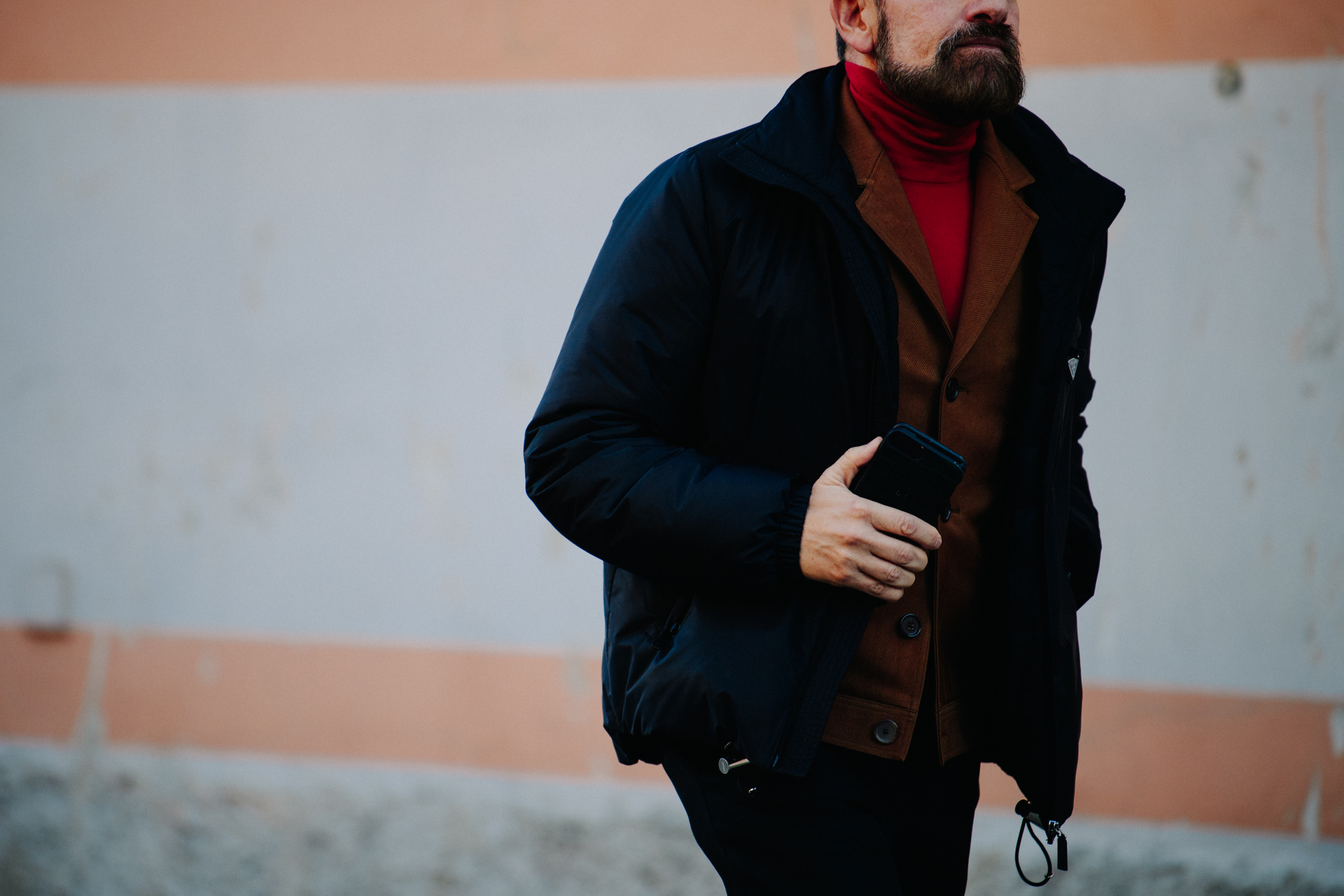 Man wearing brown coat