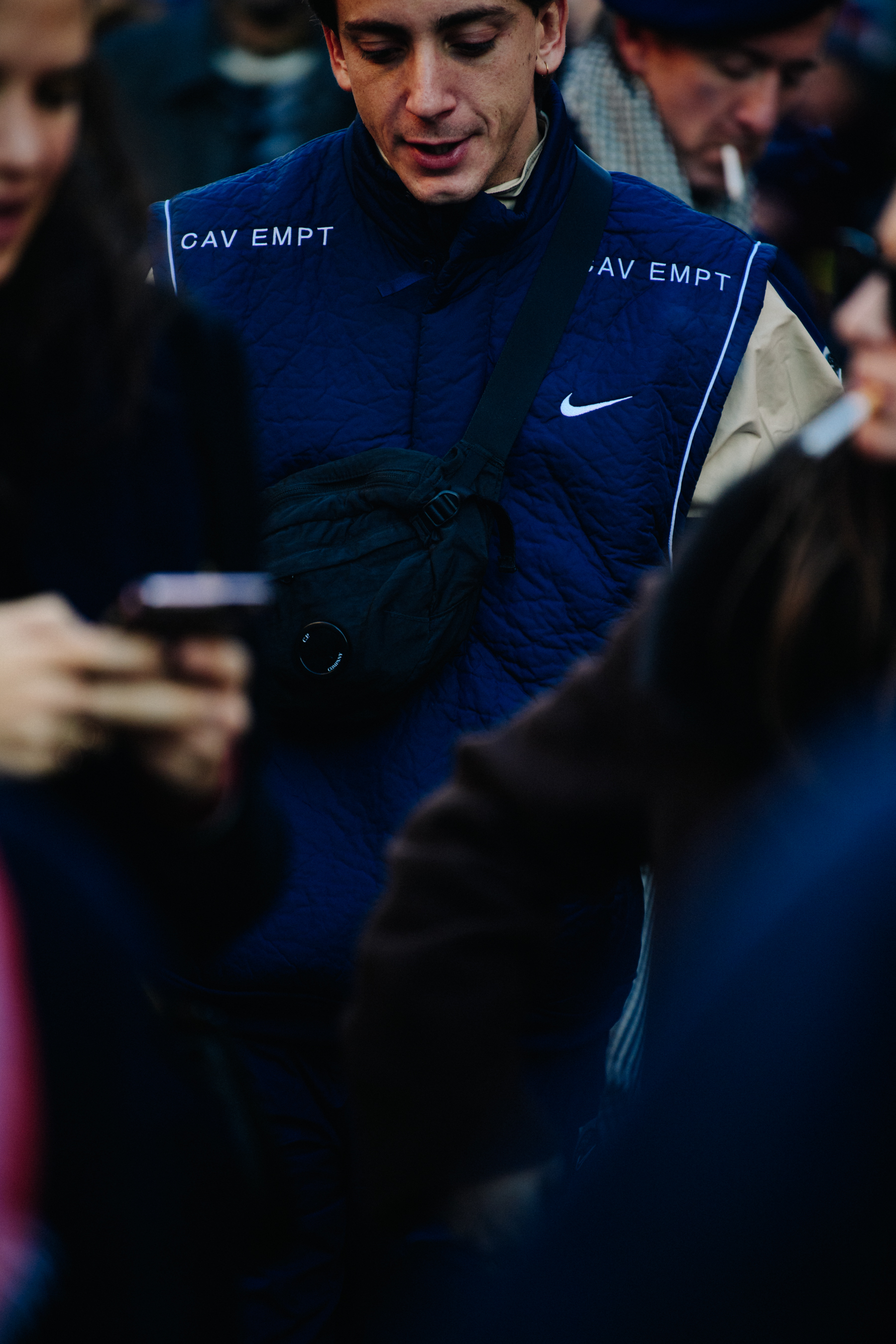 Man wearing Nike x Cav Empt