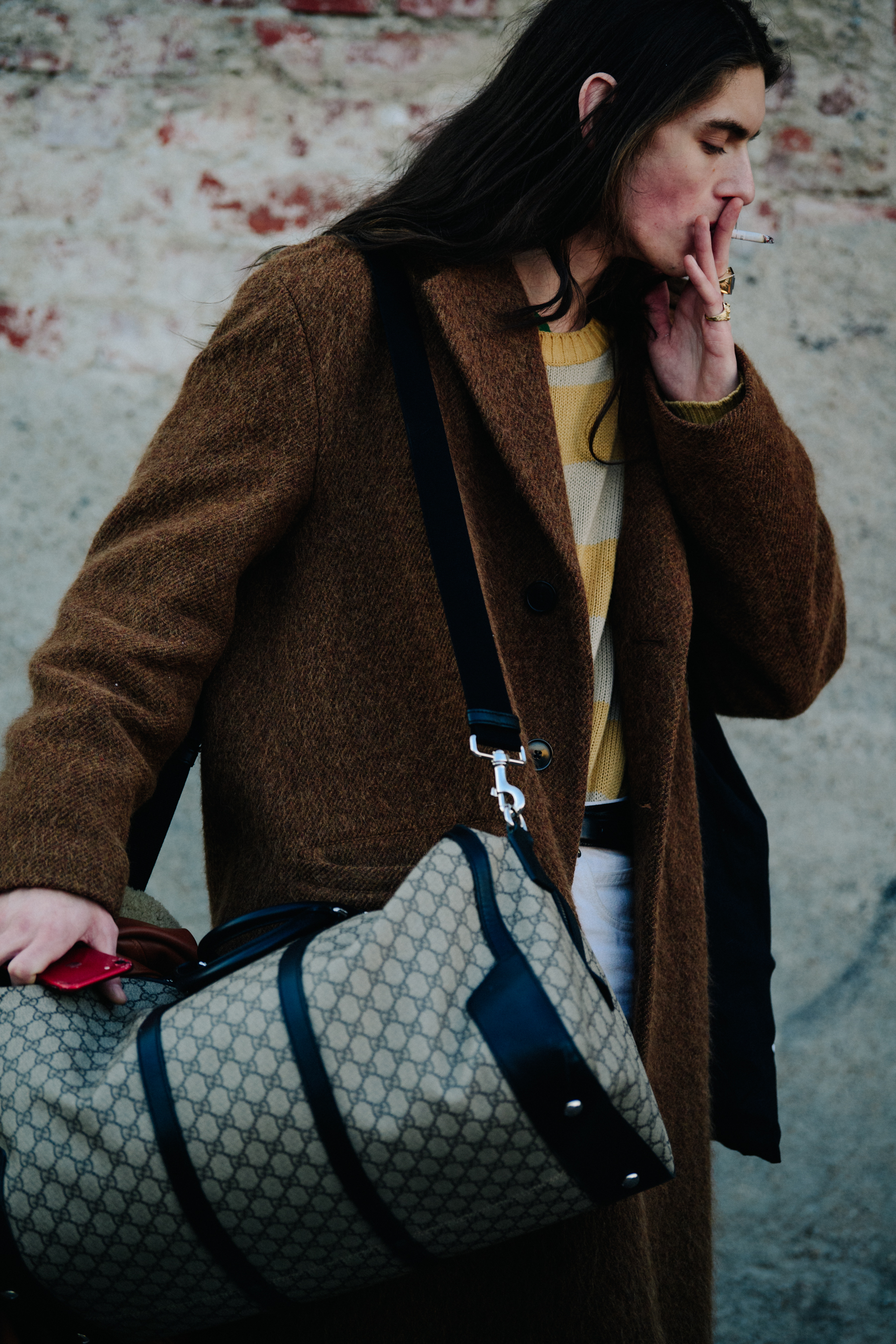 Model carrying Gucci bag