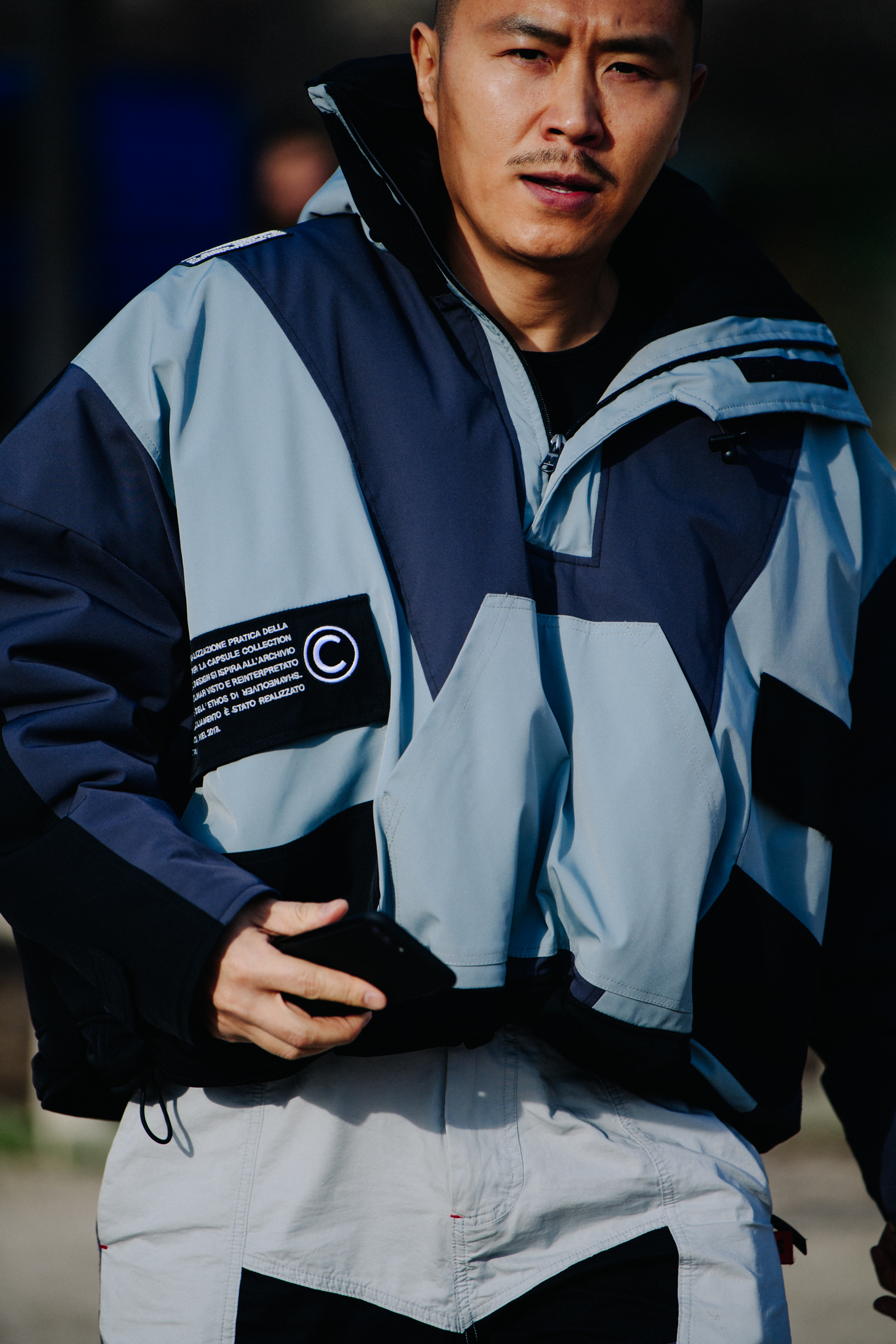 Man wearing blue jacket