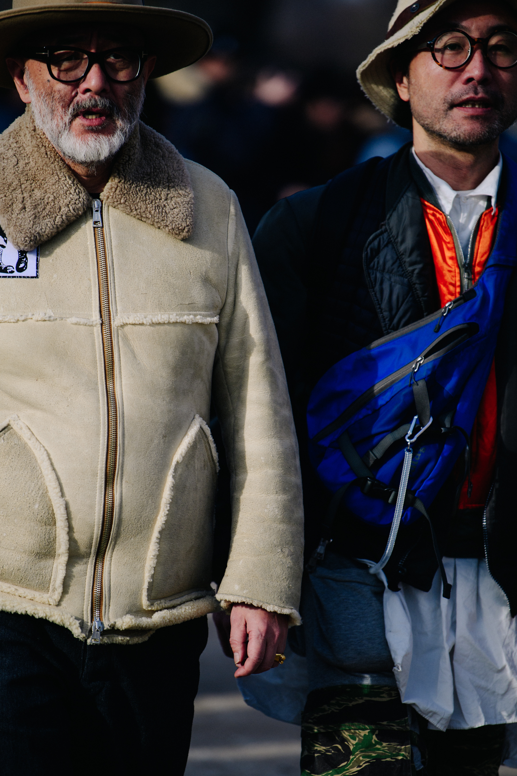 Two men wearing glasses