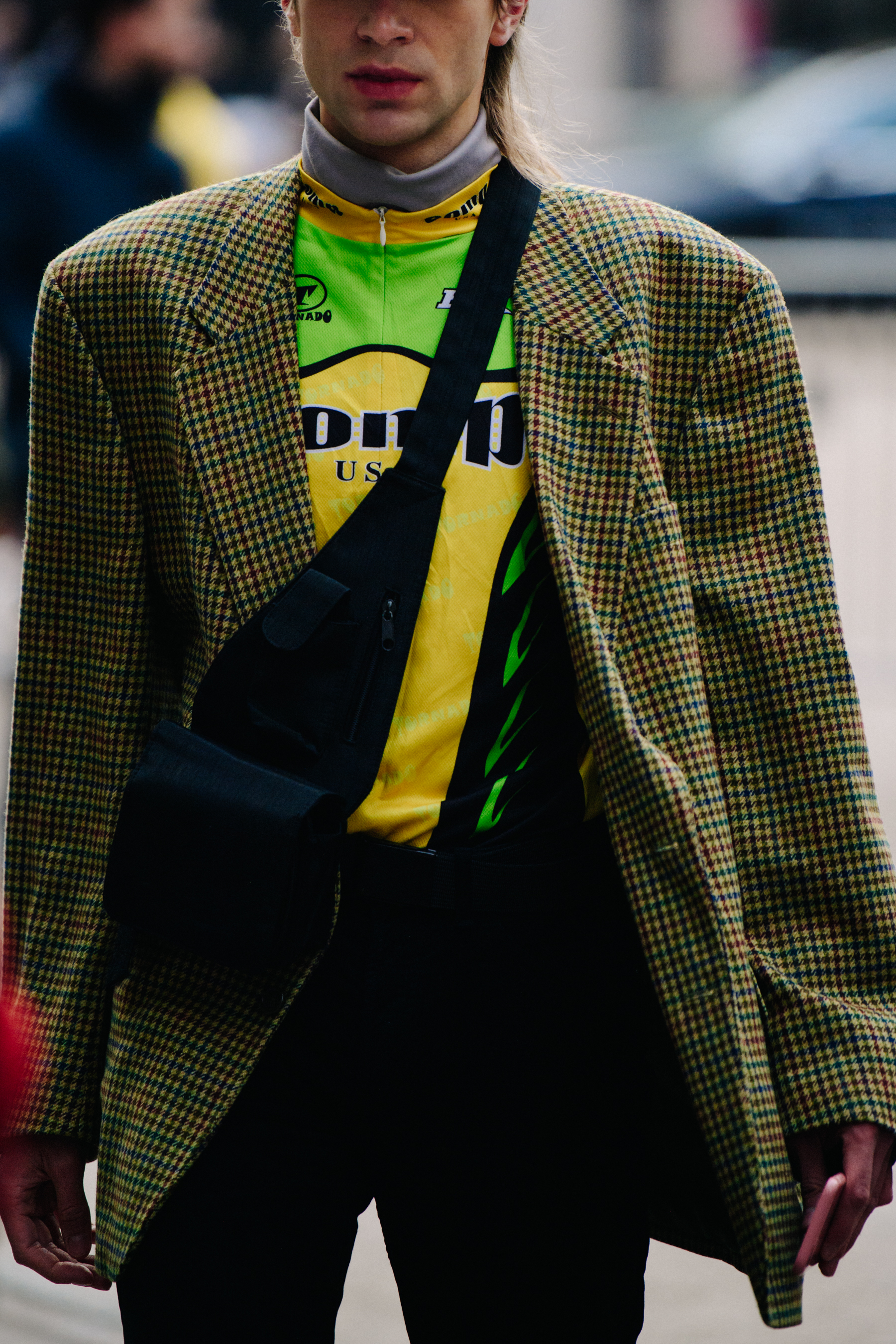 Man wearing yellow motorcycle shirt
