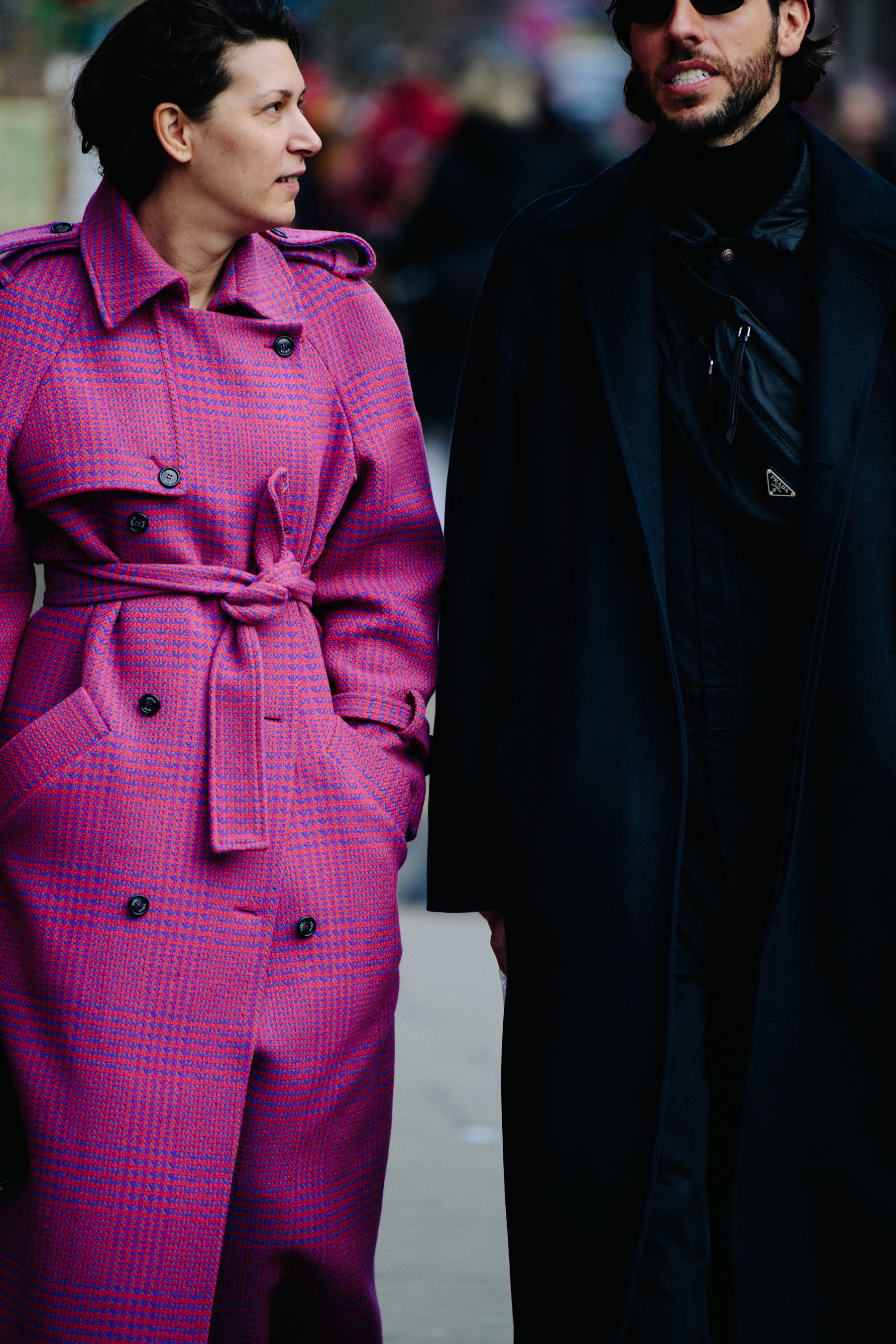 Couple wearing long winter coats