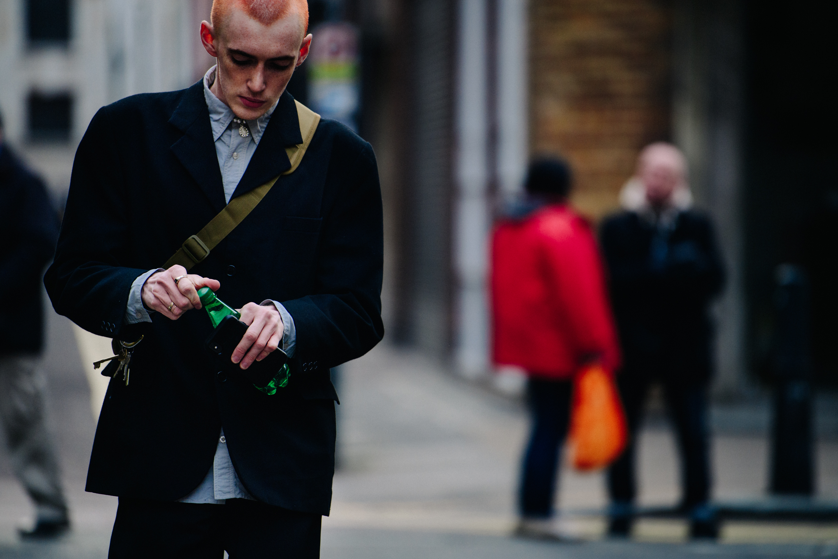 Man wearing black suit jacket