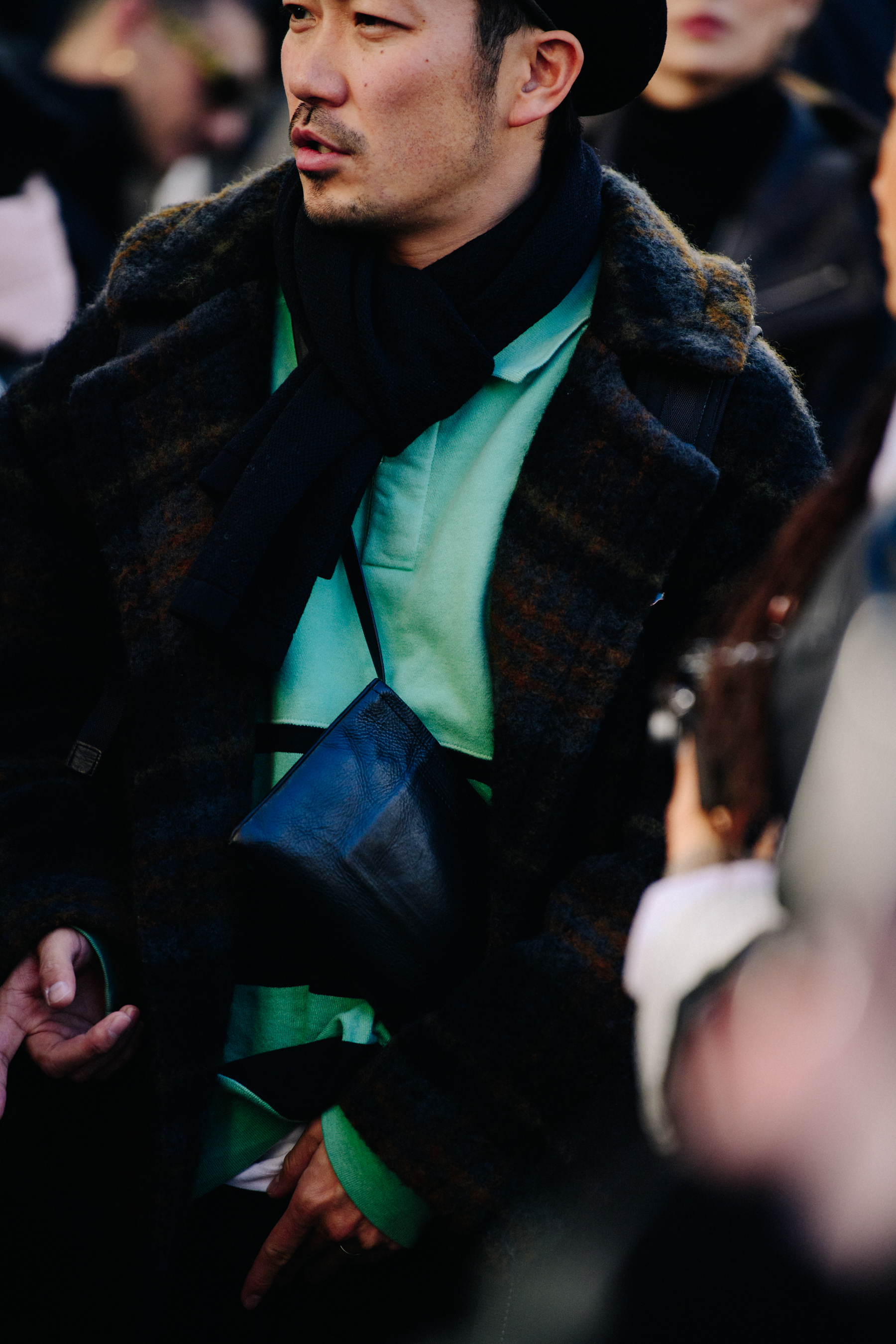 Man wearing green polo shirt