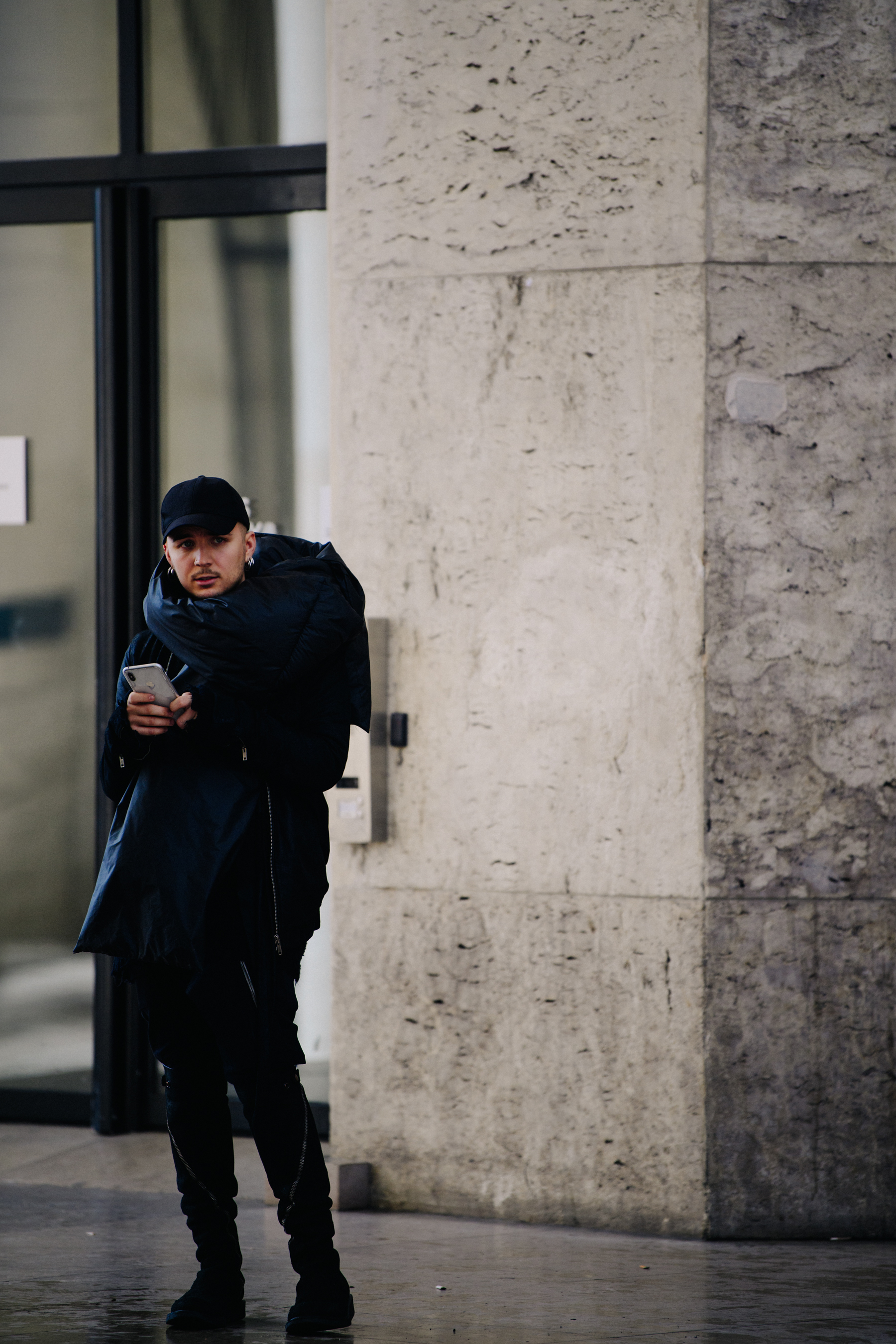 Man wearing black puffer coat
