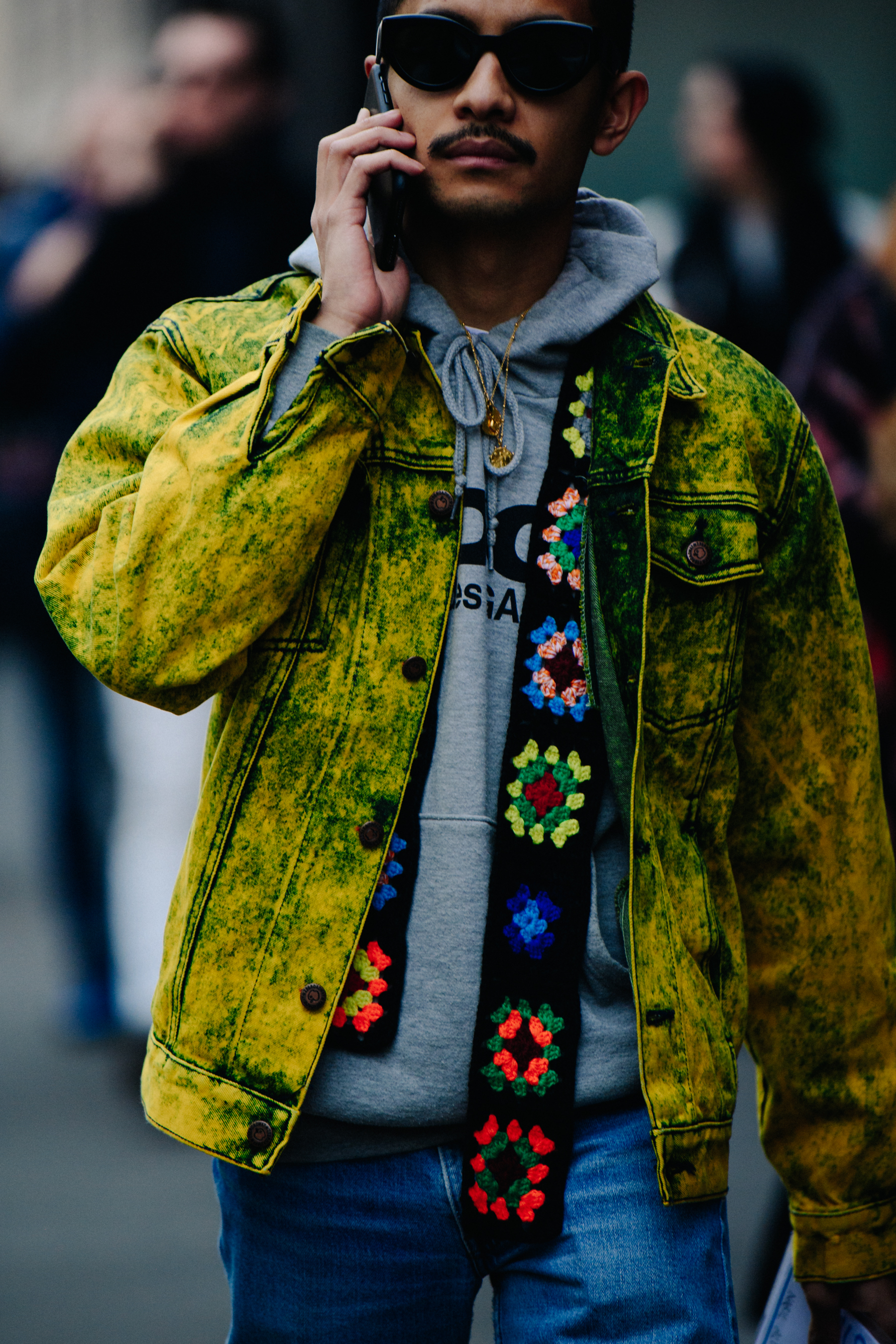 Man wearing yellow denim jacket