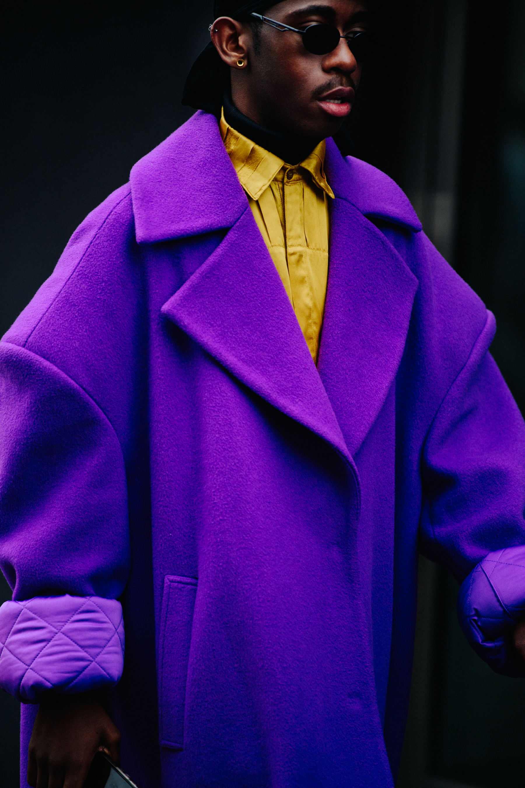Man wearing purple coat