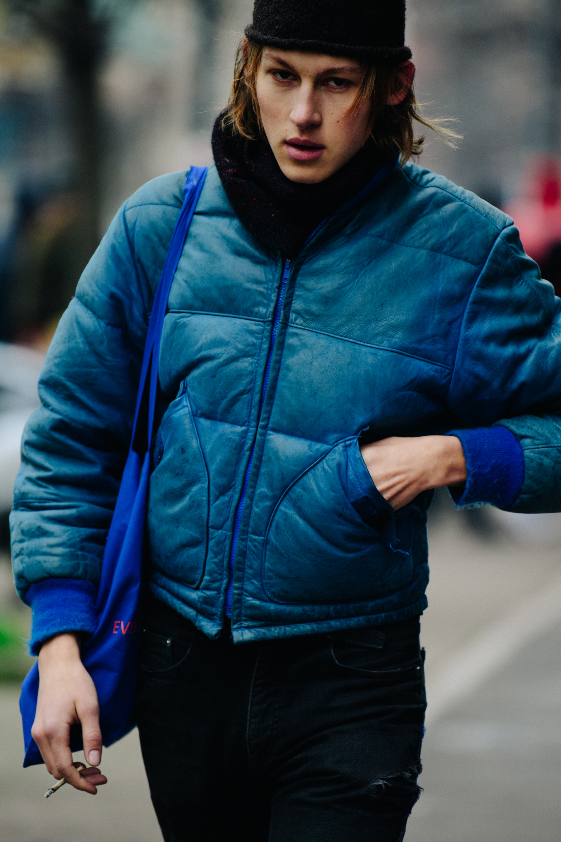 Model wearing blue coat