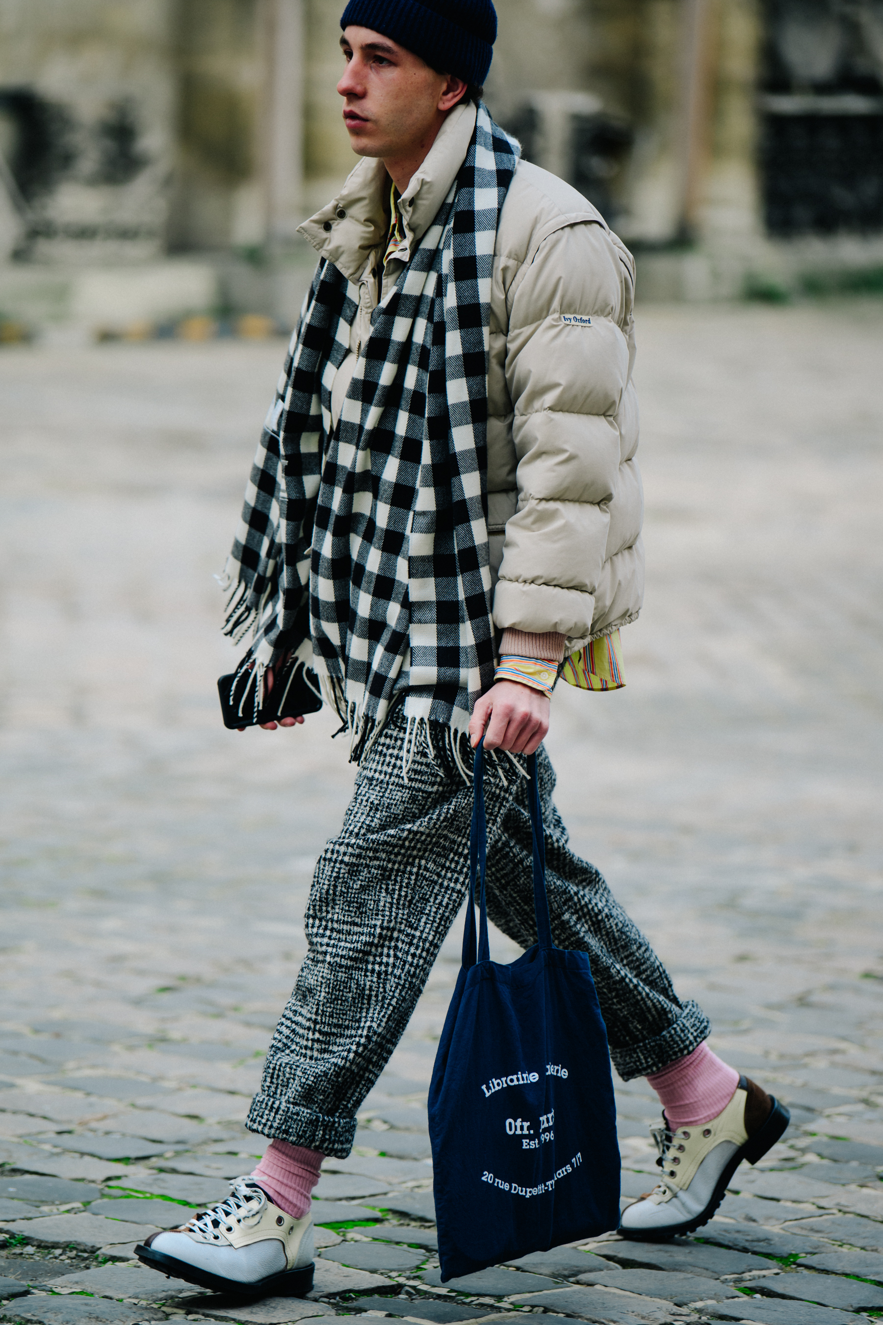 Man wearing check scarf