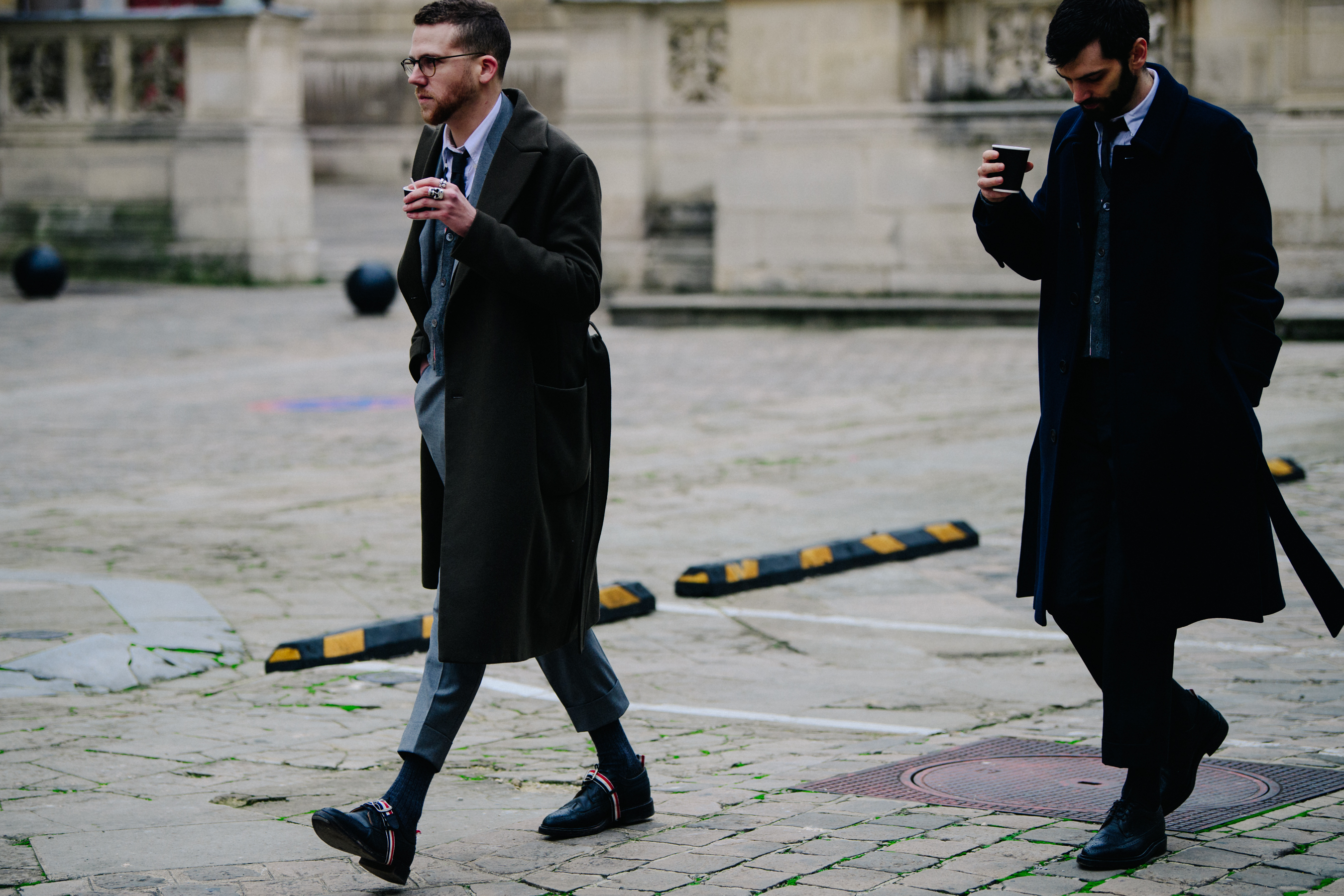Two men wearing Thom Browne