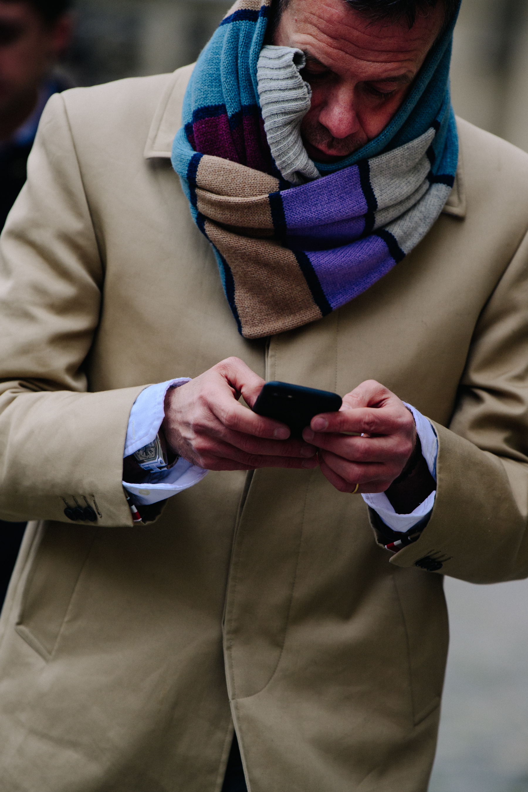 Man wearing large scarf