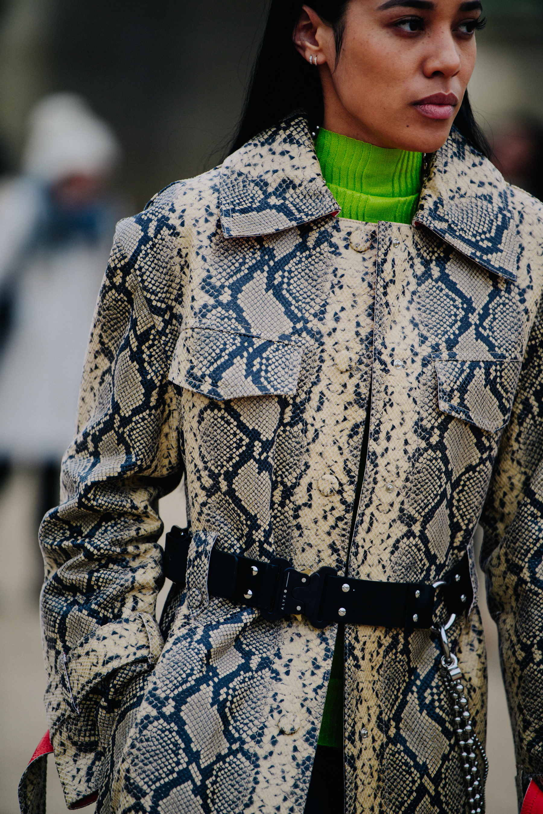 Woman wearing snakeskin jacket