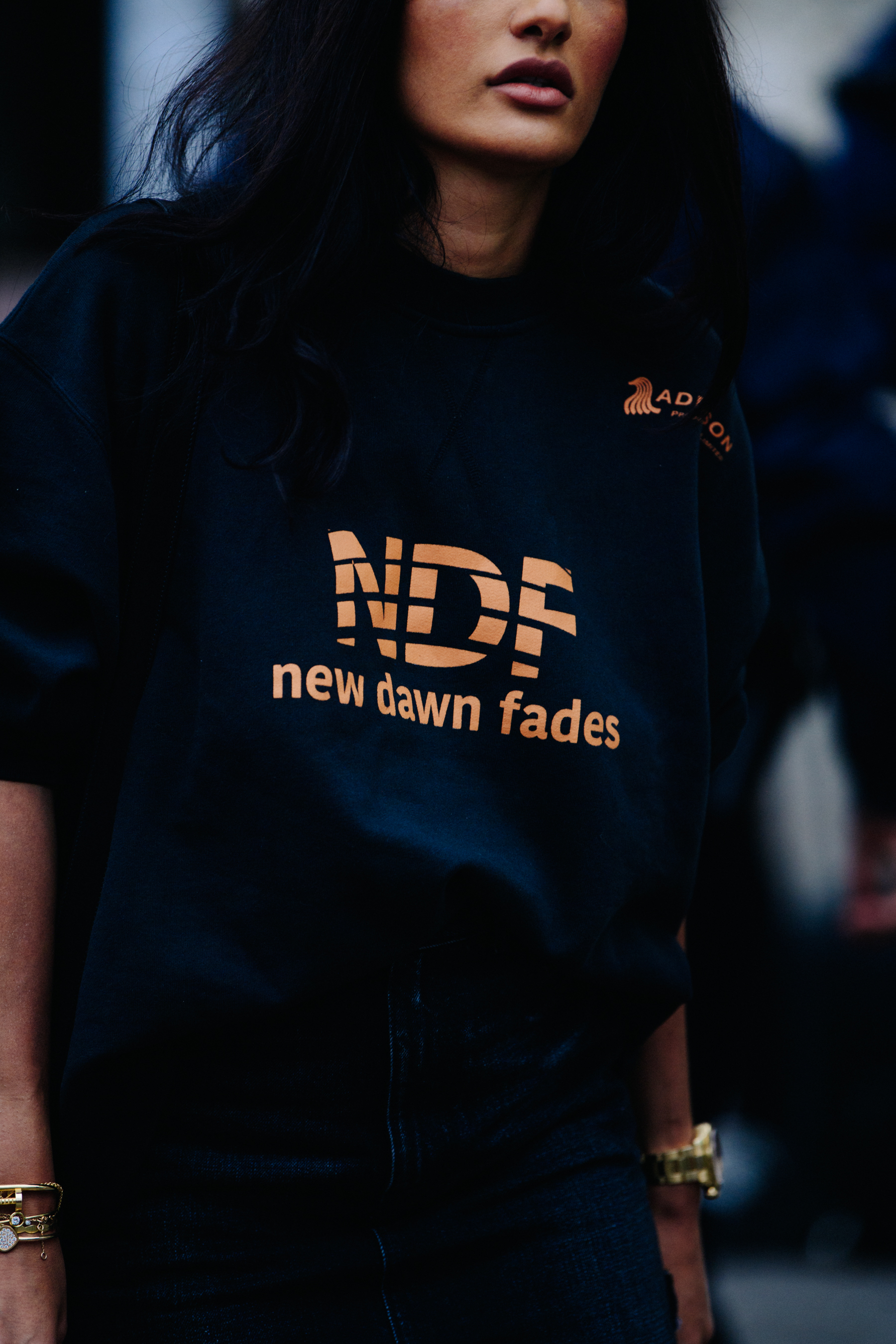 Woman wearing black jumper