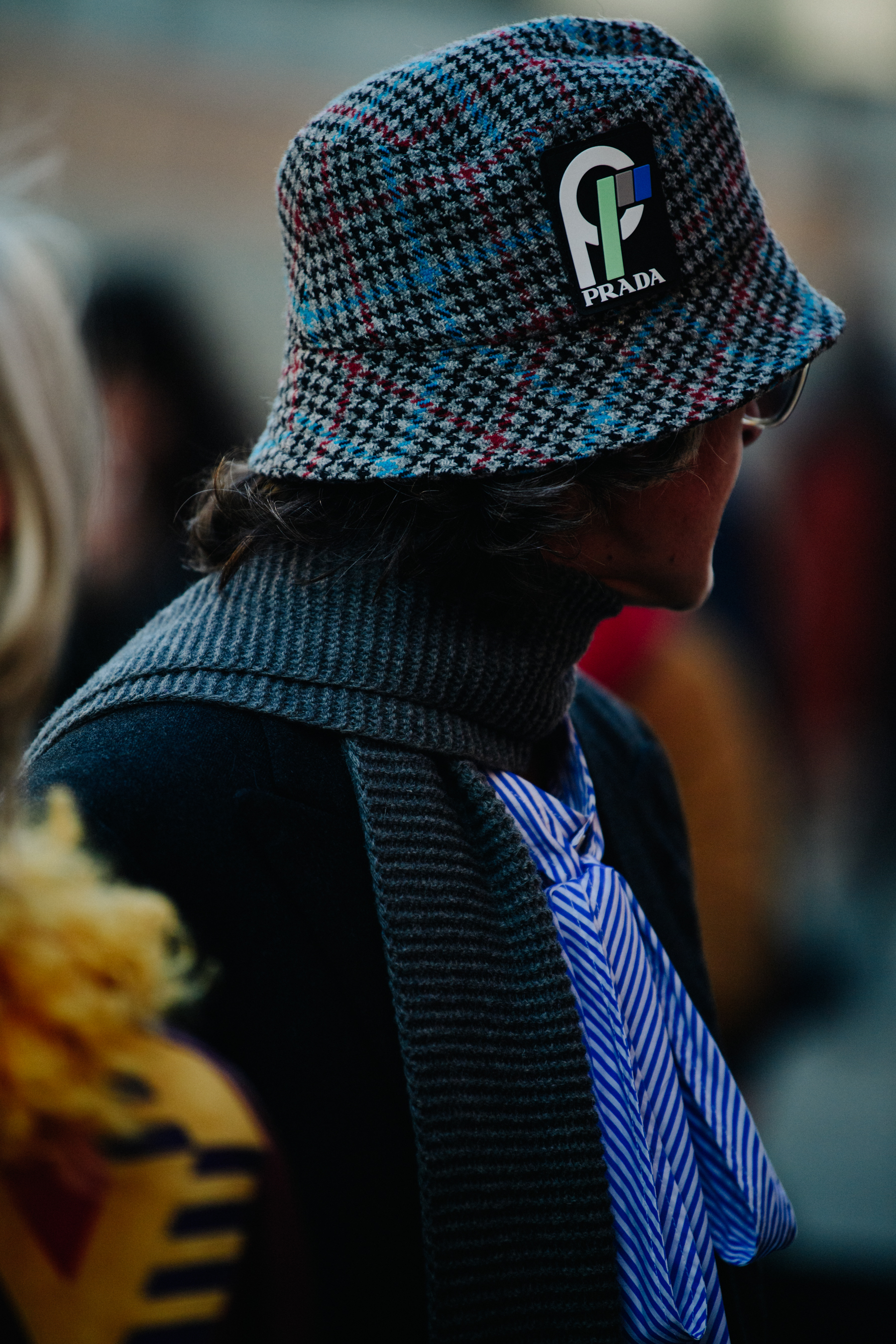 Woman wearing Prada hat