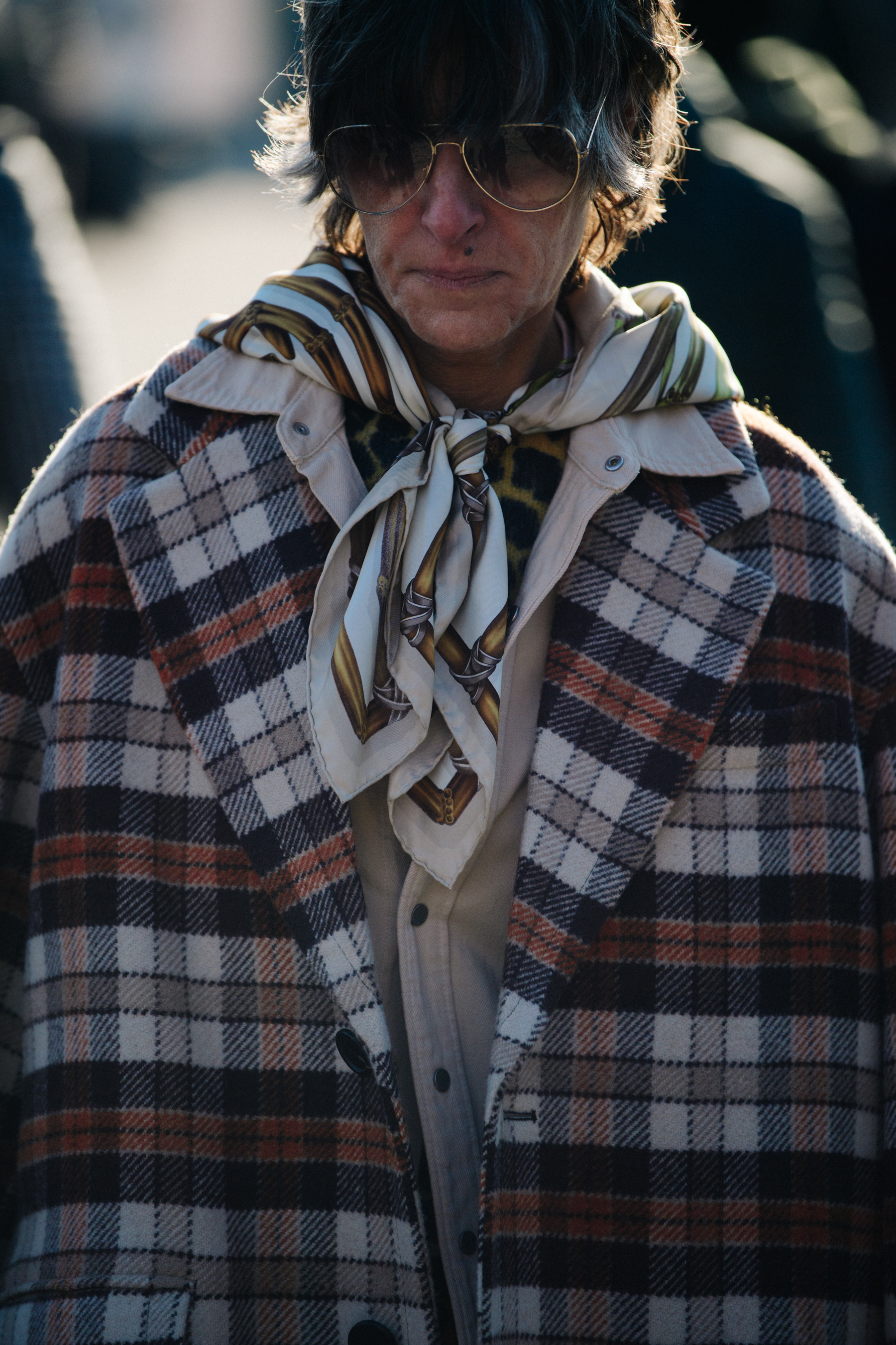Woman wearing check wool coat