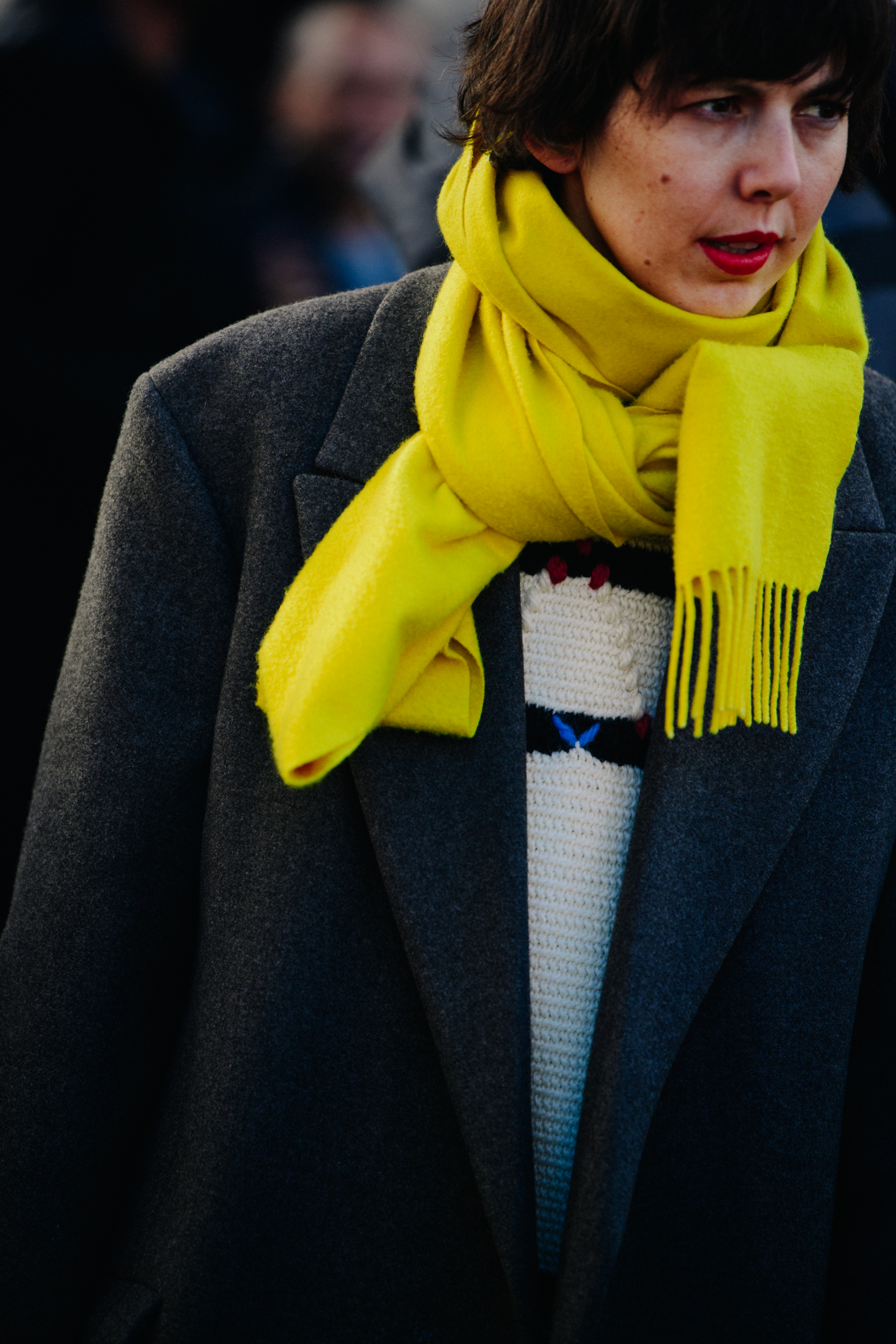 Woman wearing yellow scarf