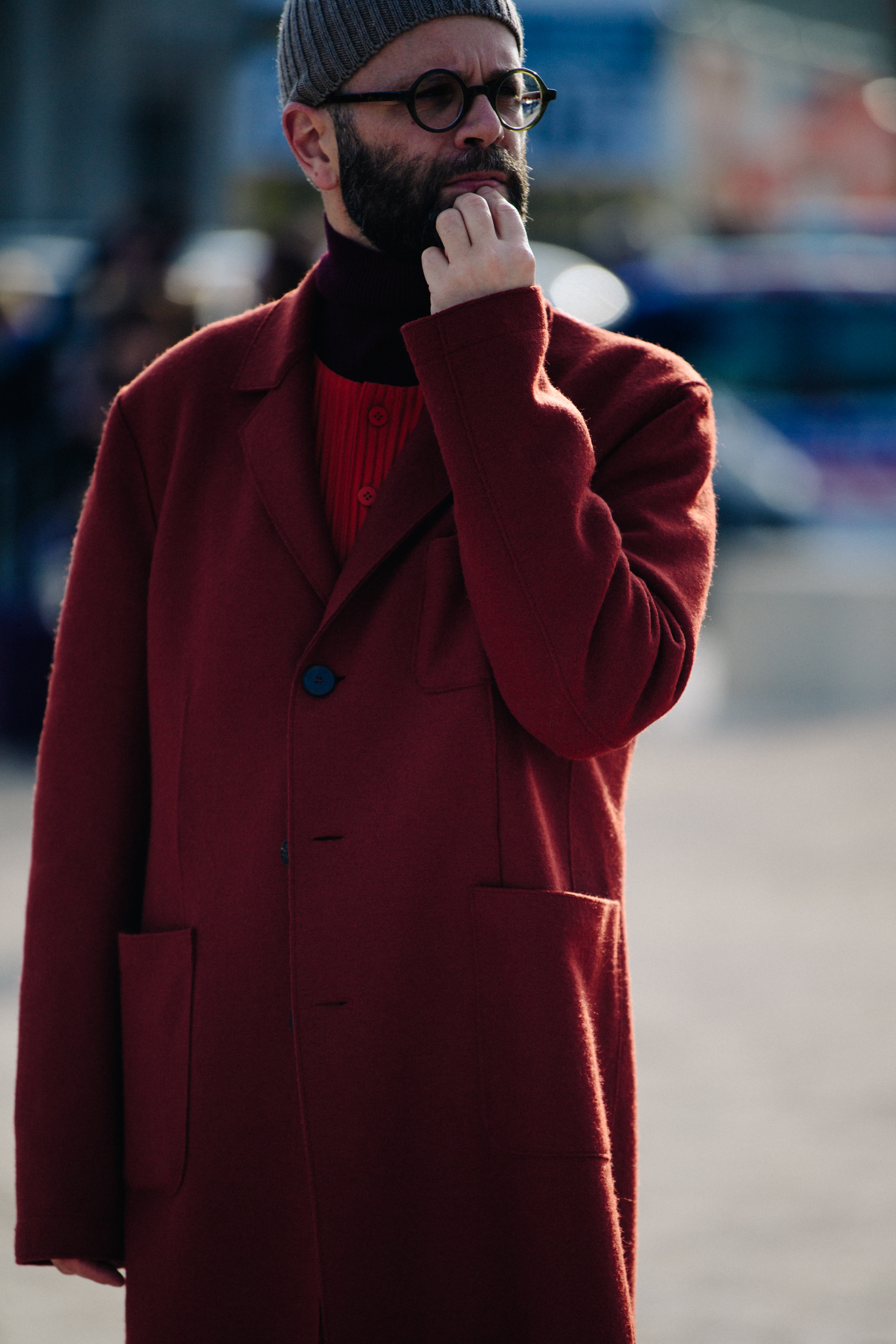 Man wearing red wool coat
