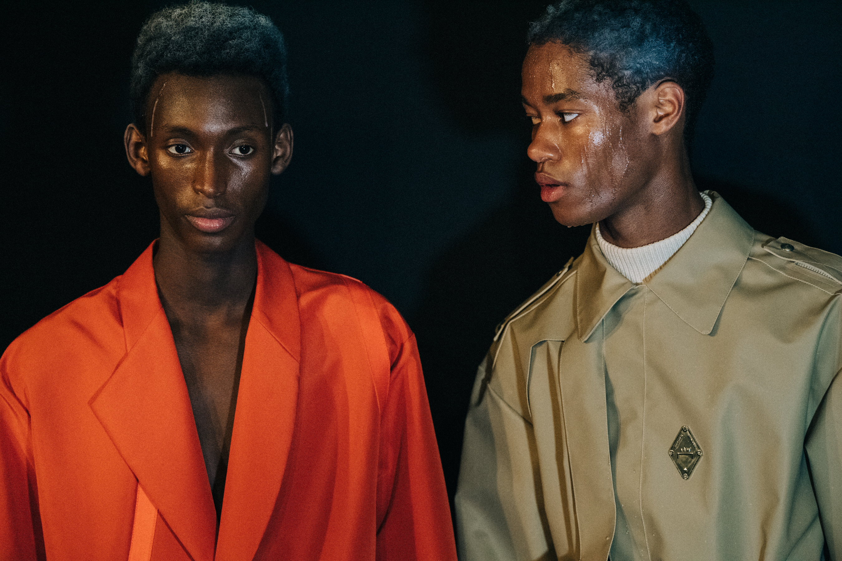 Models wearing orange and tan at A COLD WALL