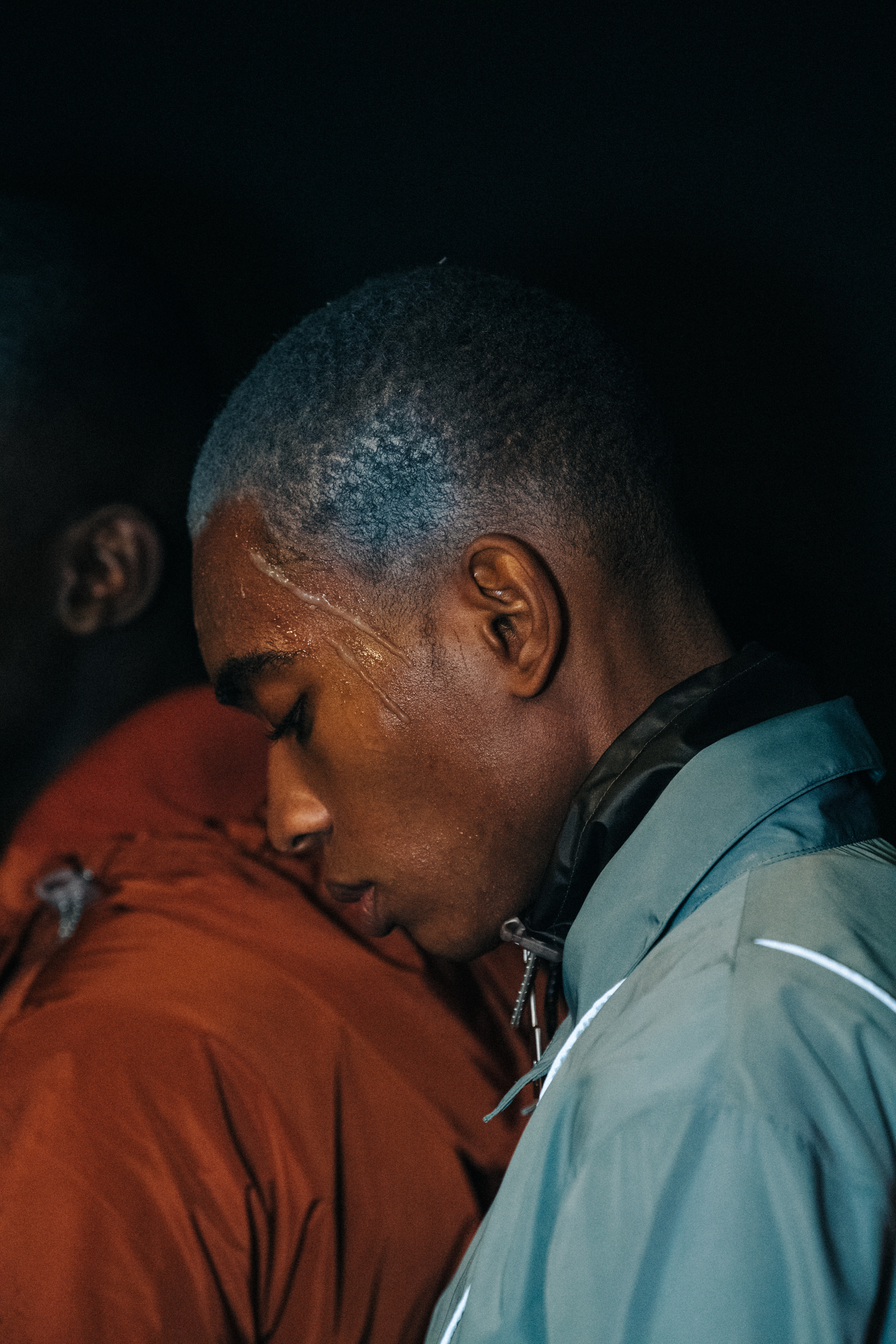 Models wearing orange and blue at A COLD WALL