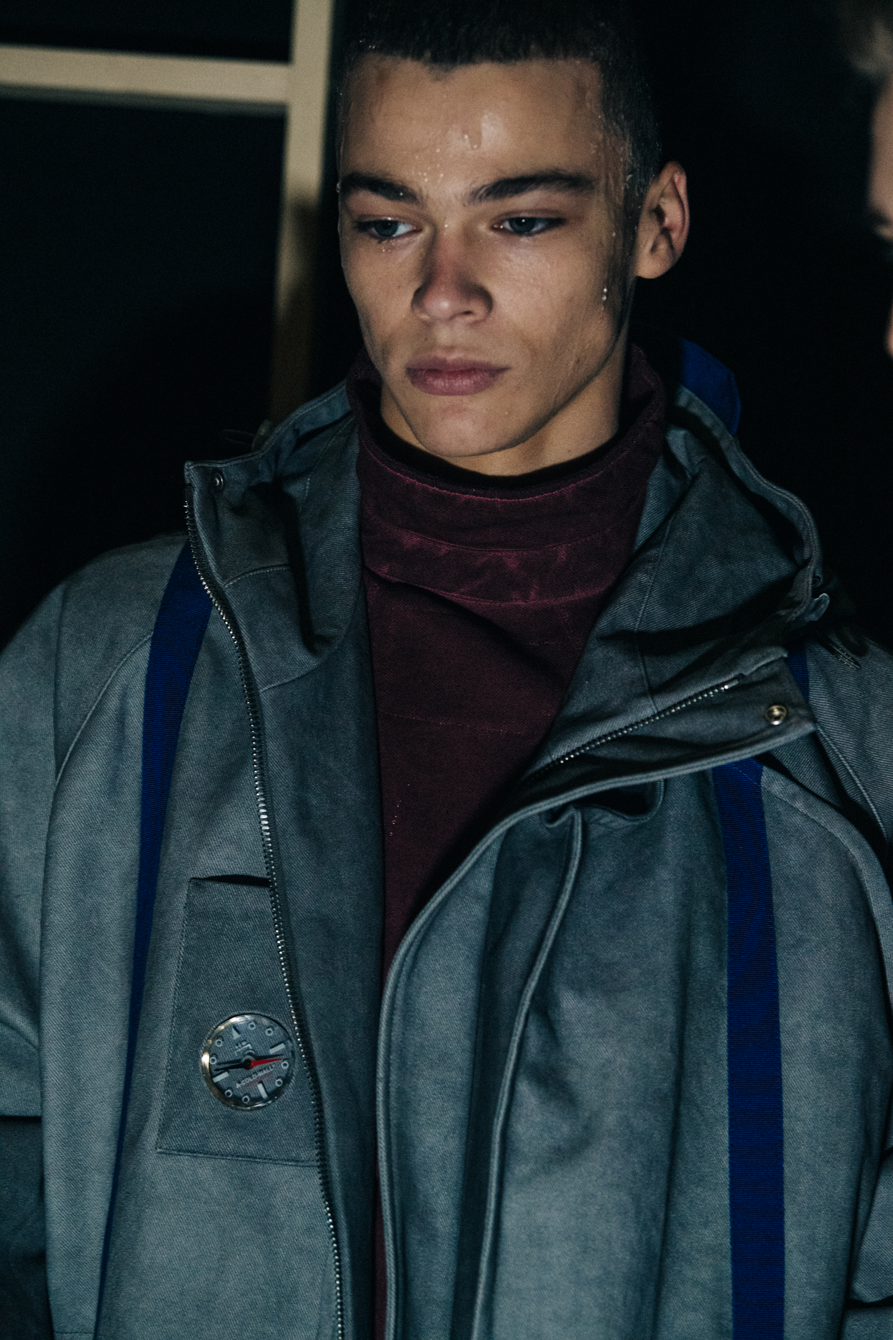 Model wearing grey coat at A COLD WALL