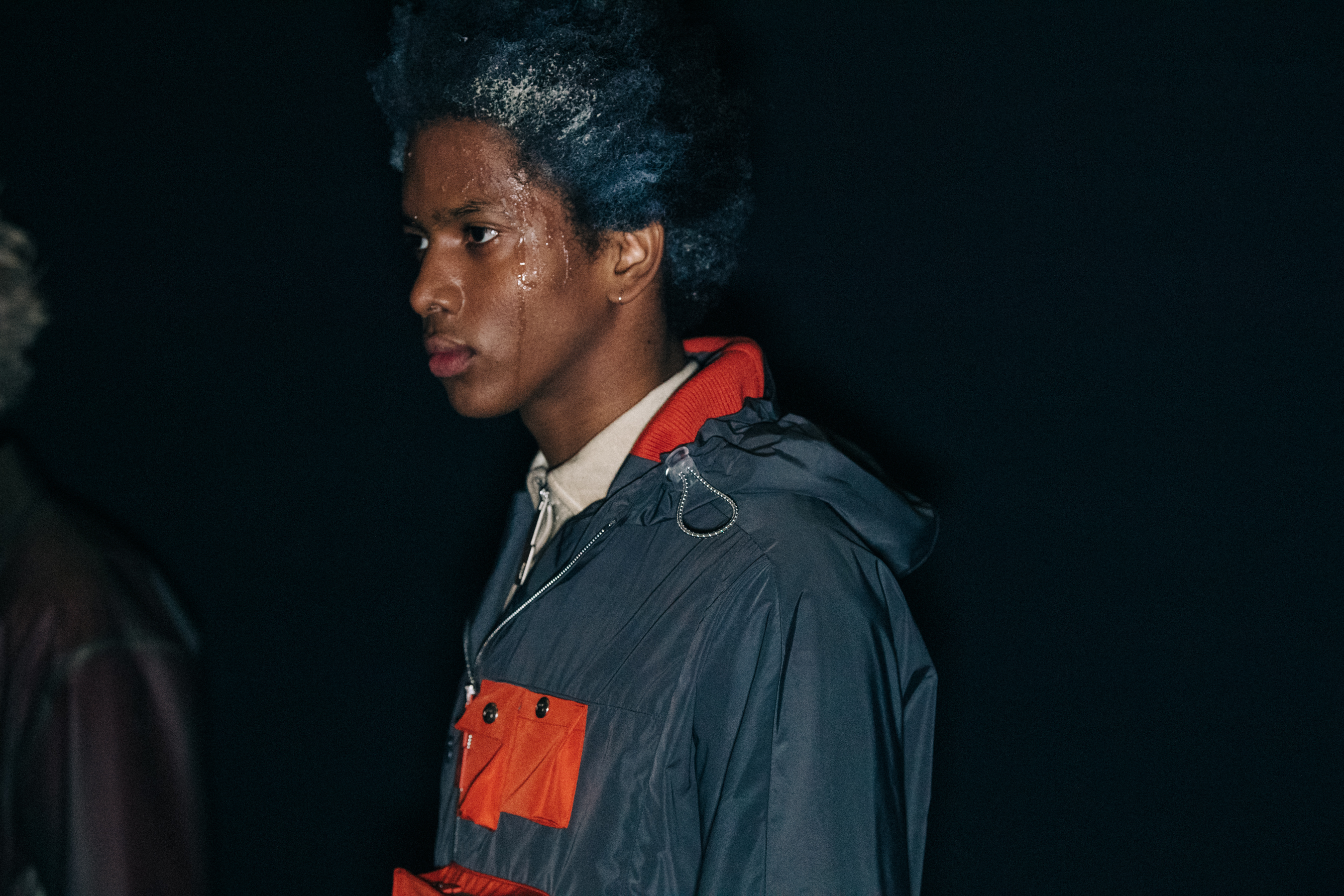 Model wearing grey coat at A COLD WALL