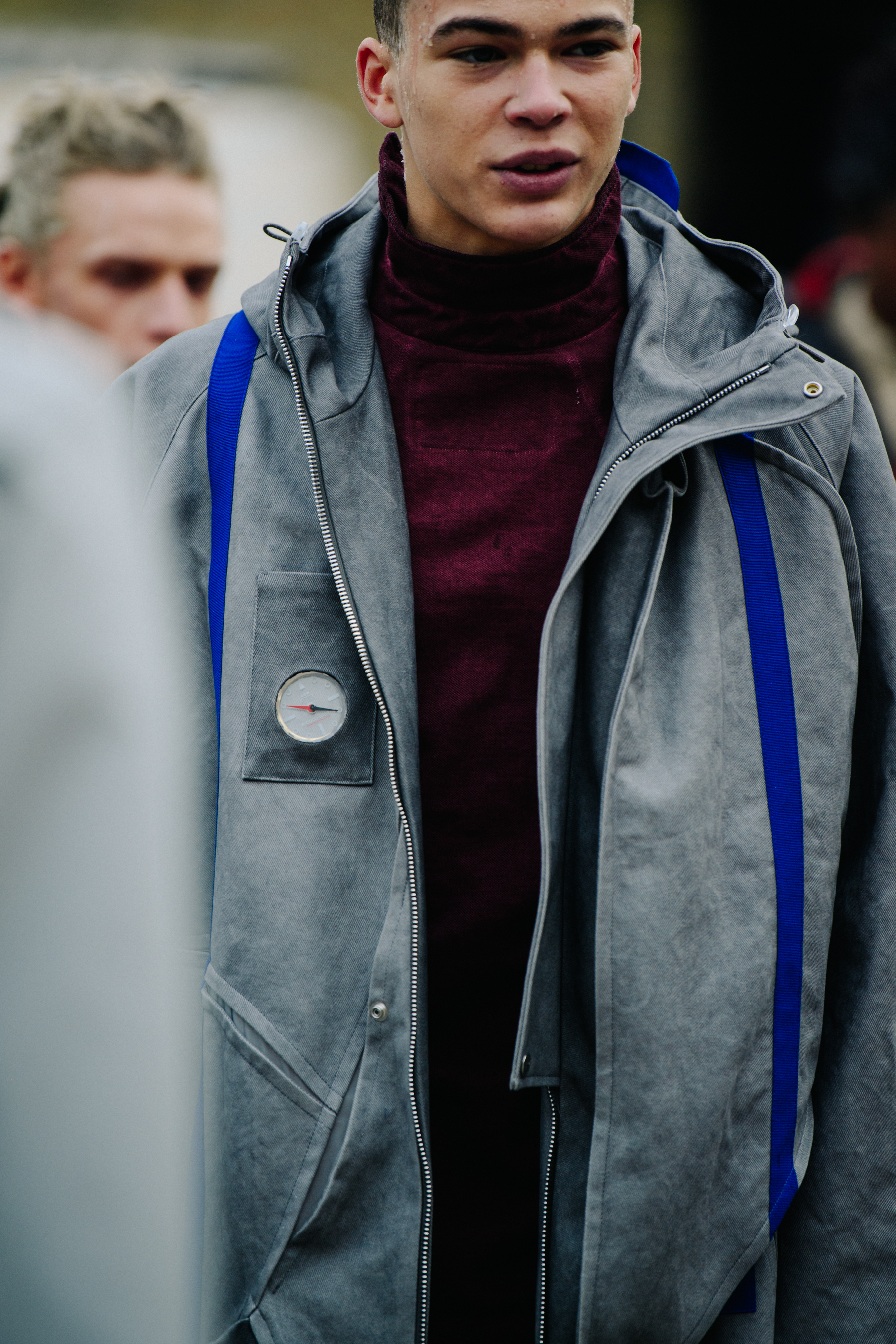Model wearing grey coat at A COLD WALL