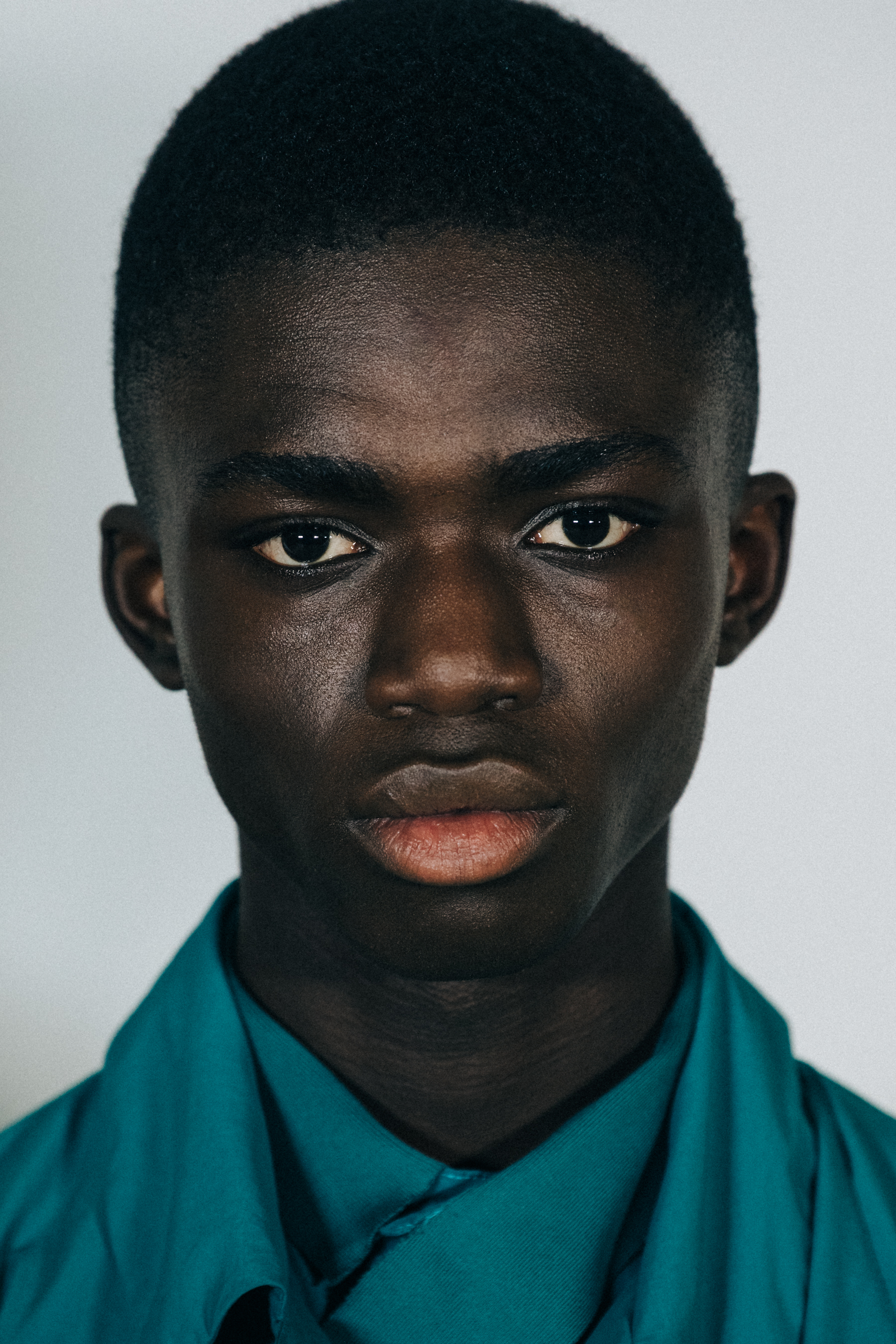 Portrait of model with short black hair