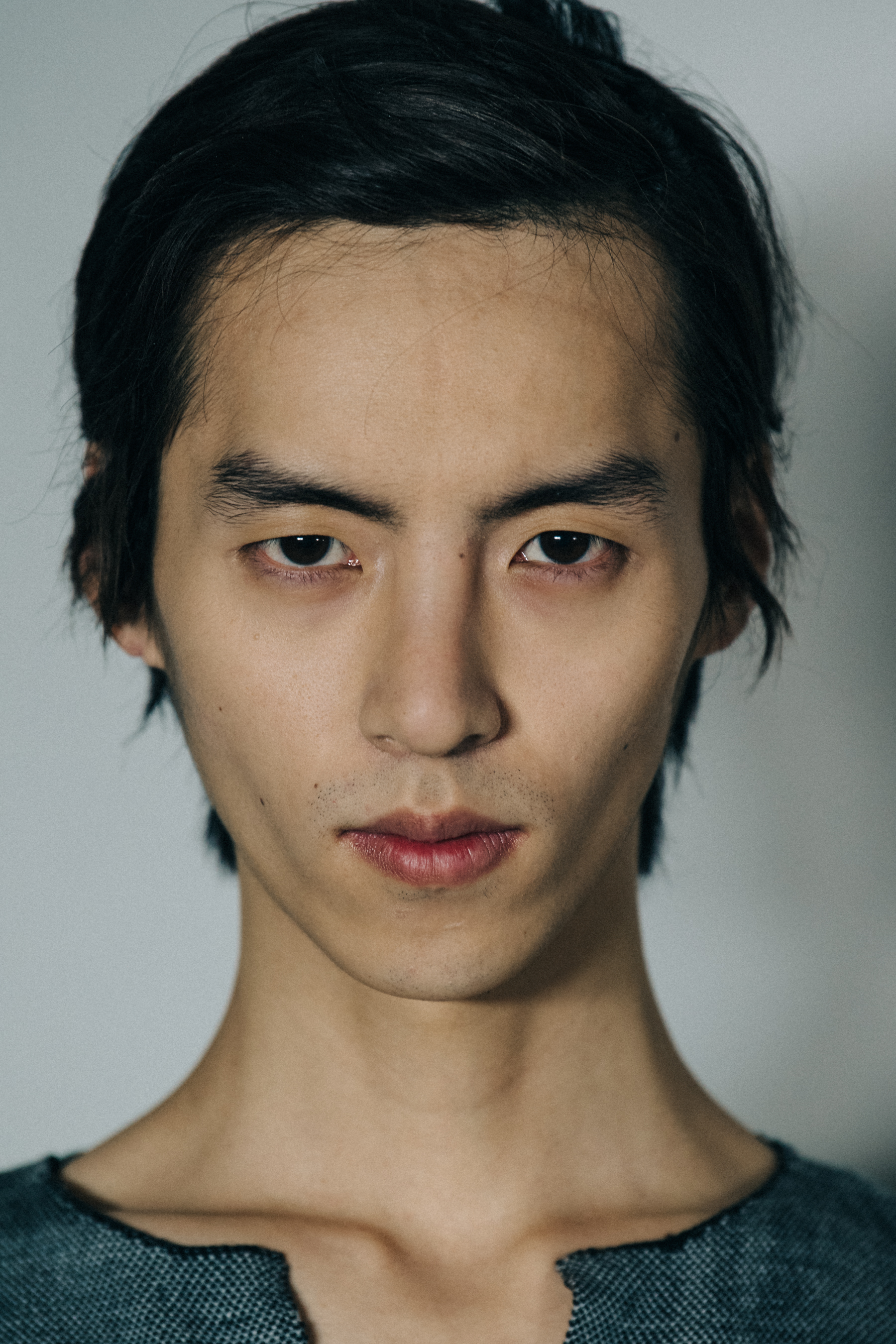Portrait of model with short dark hair