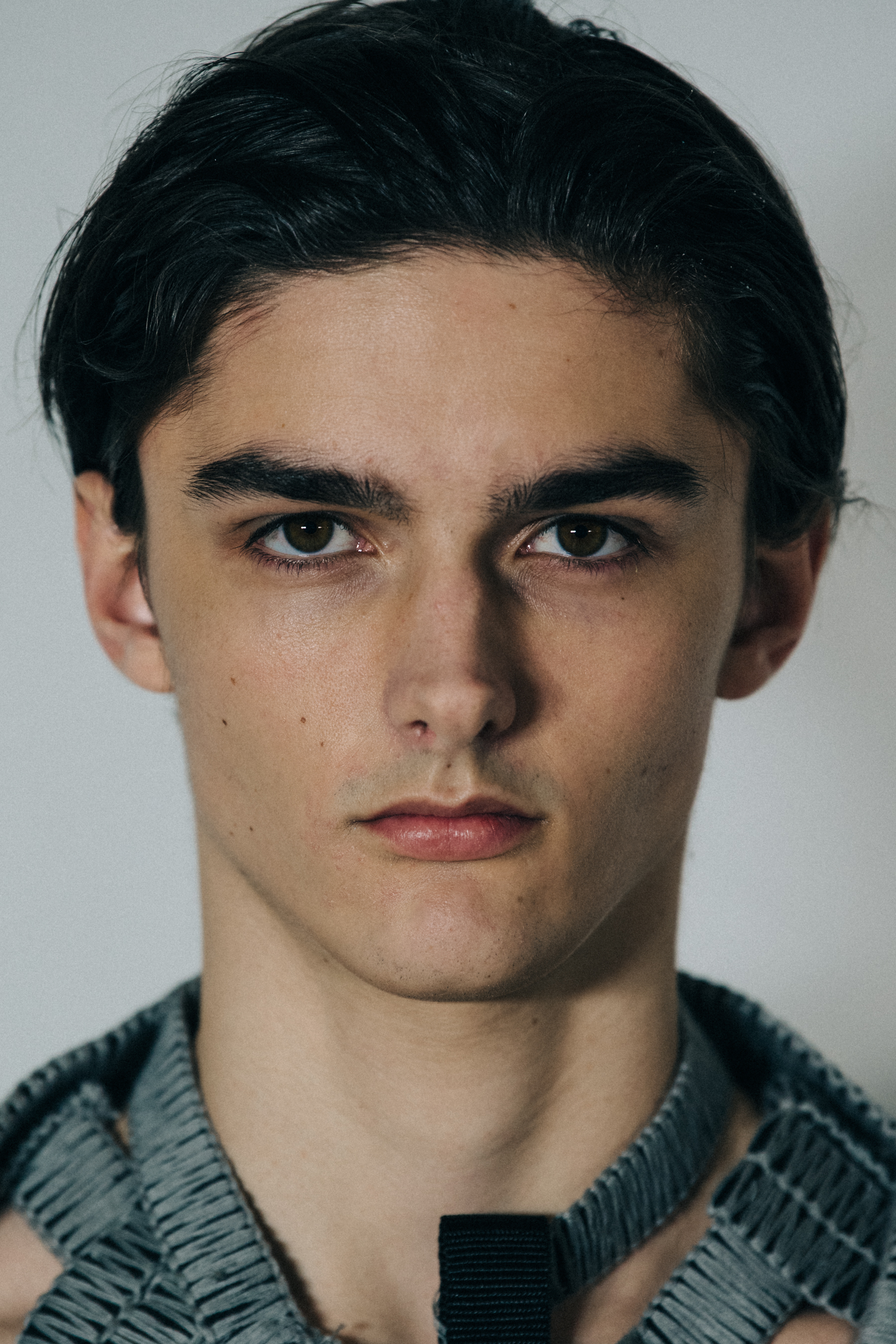 Portrait of model with short dark hair