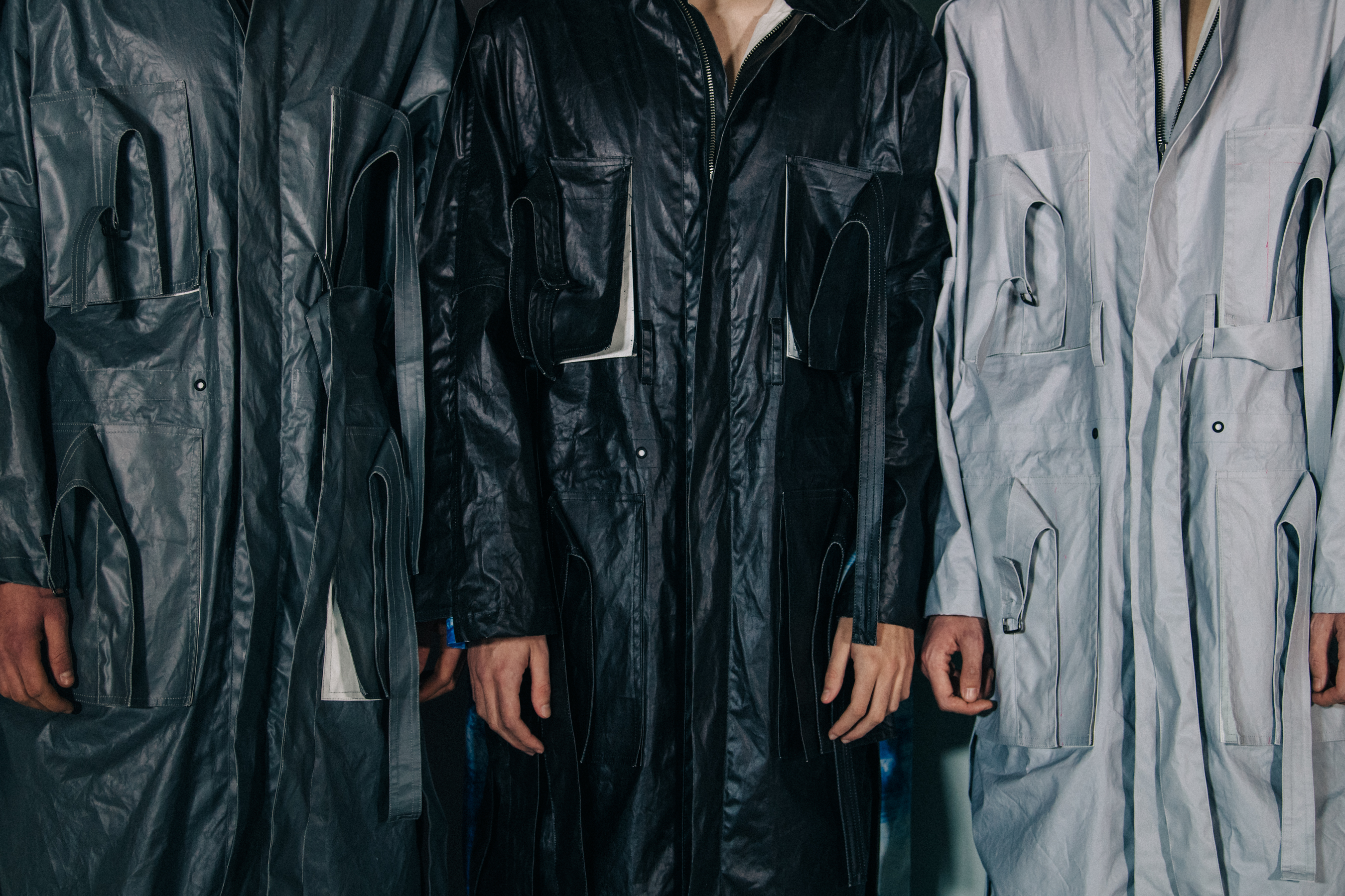 Models wearing hooded coats