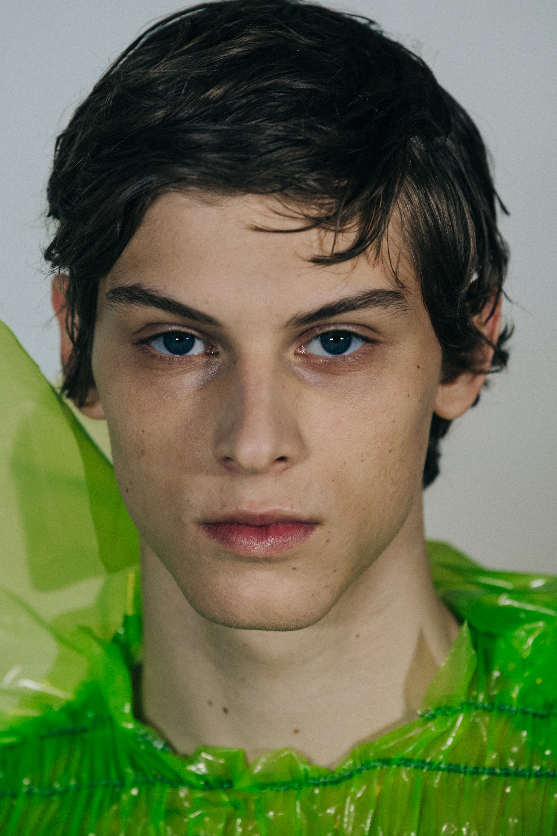 Portrait of model with short dark hair
