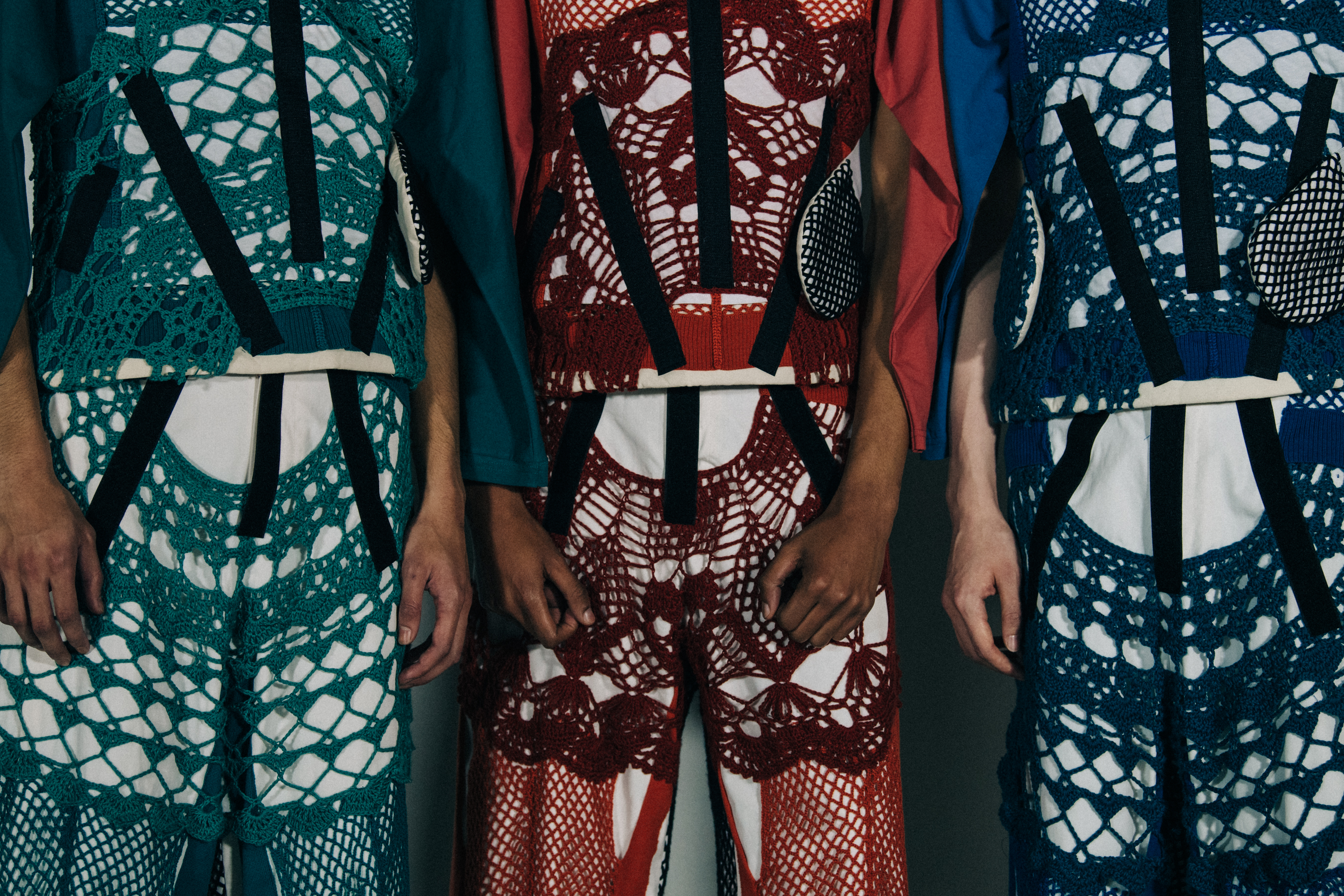 Models wearing colourful outfits at Craig Green
