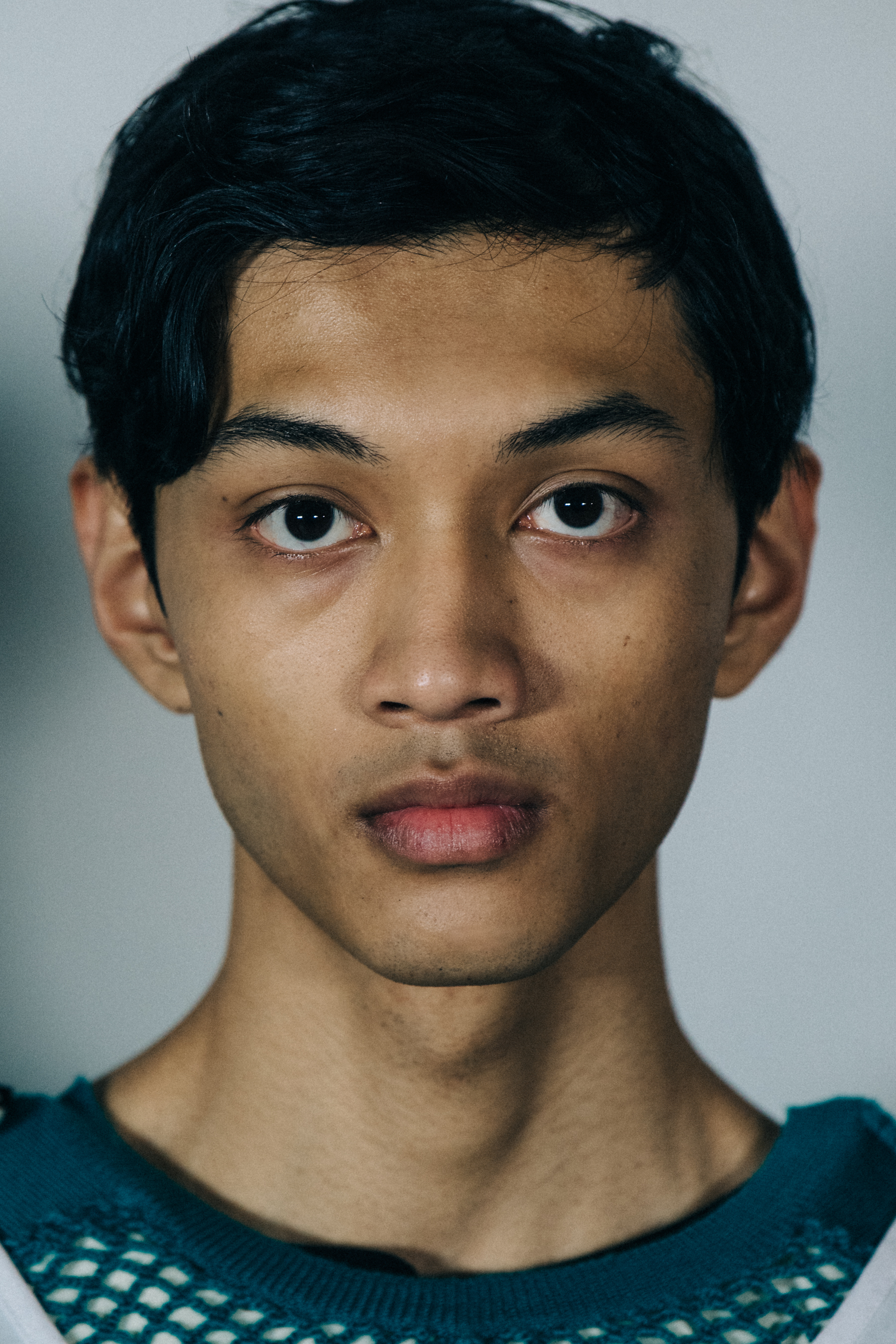 Portrait of model with short dark hair