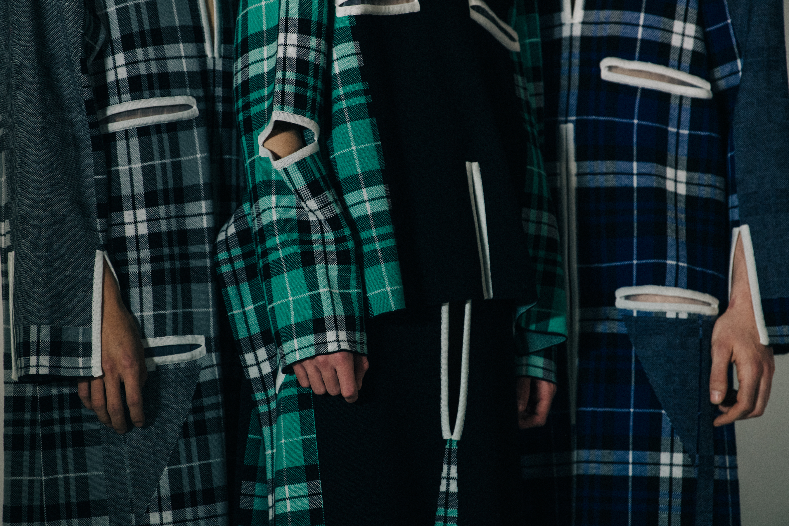 Models wearing colourful outfits at Craig Green