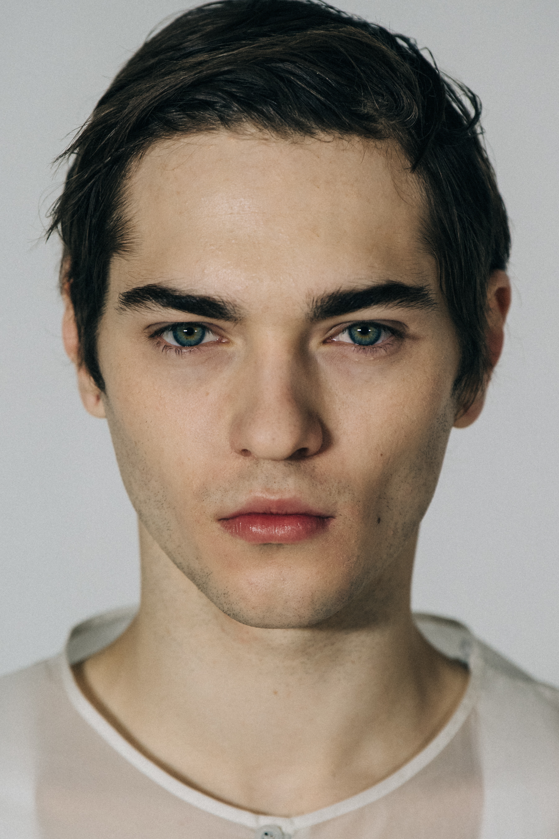Portrait of model with short dark hair