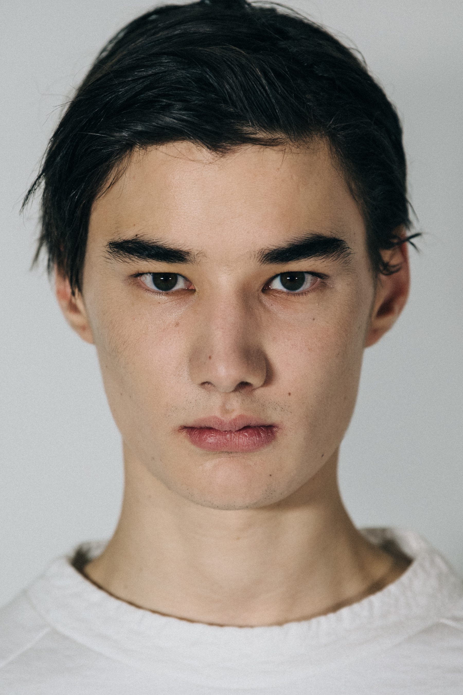 Portrait of model with short dark hair