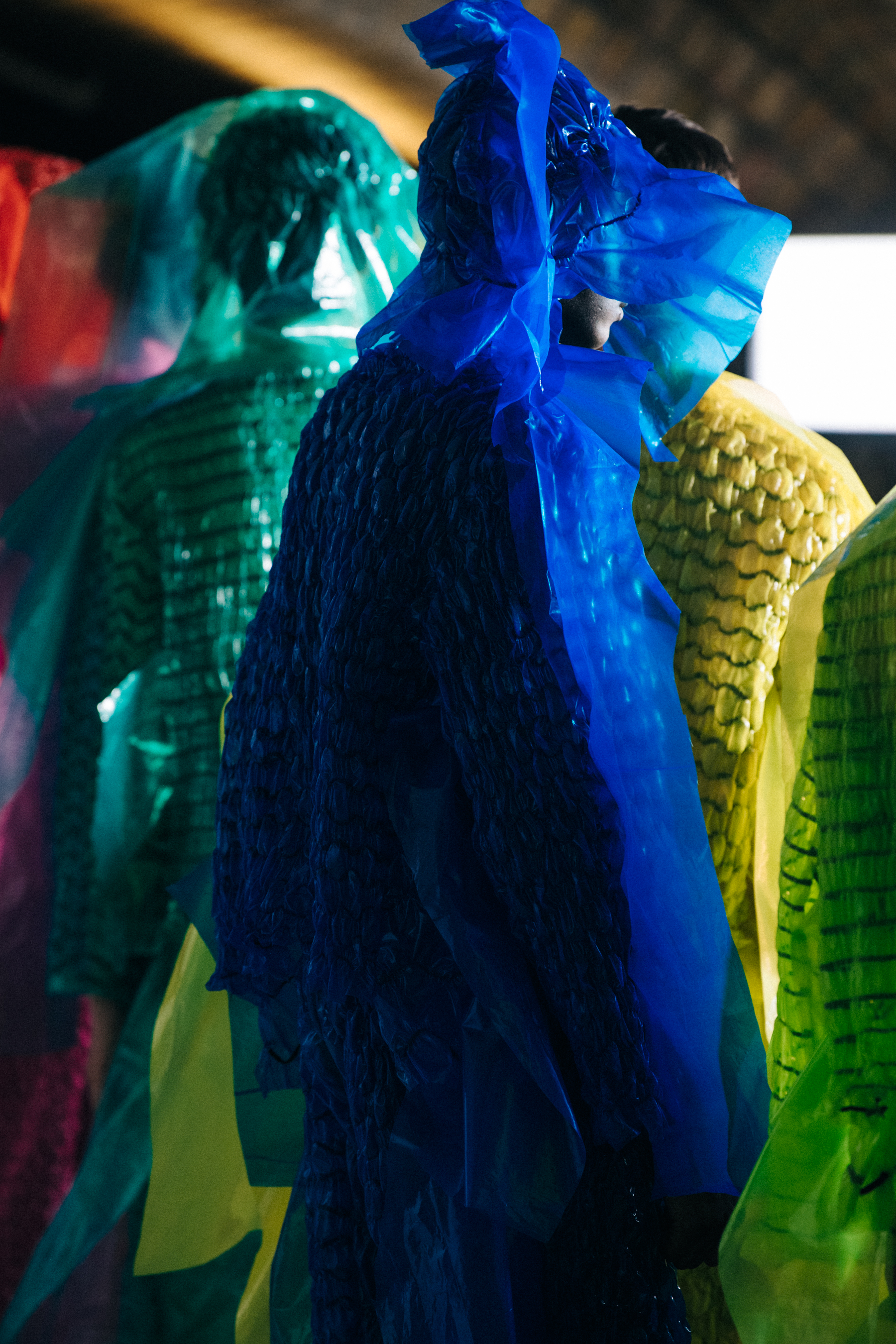 Models wearing colourful outfits at Craig Green