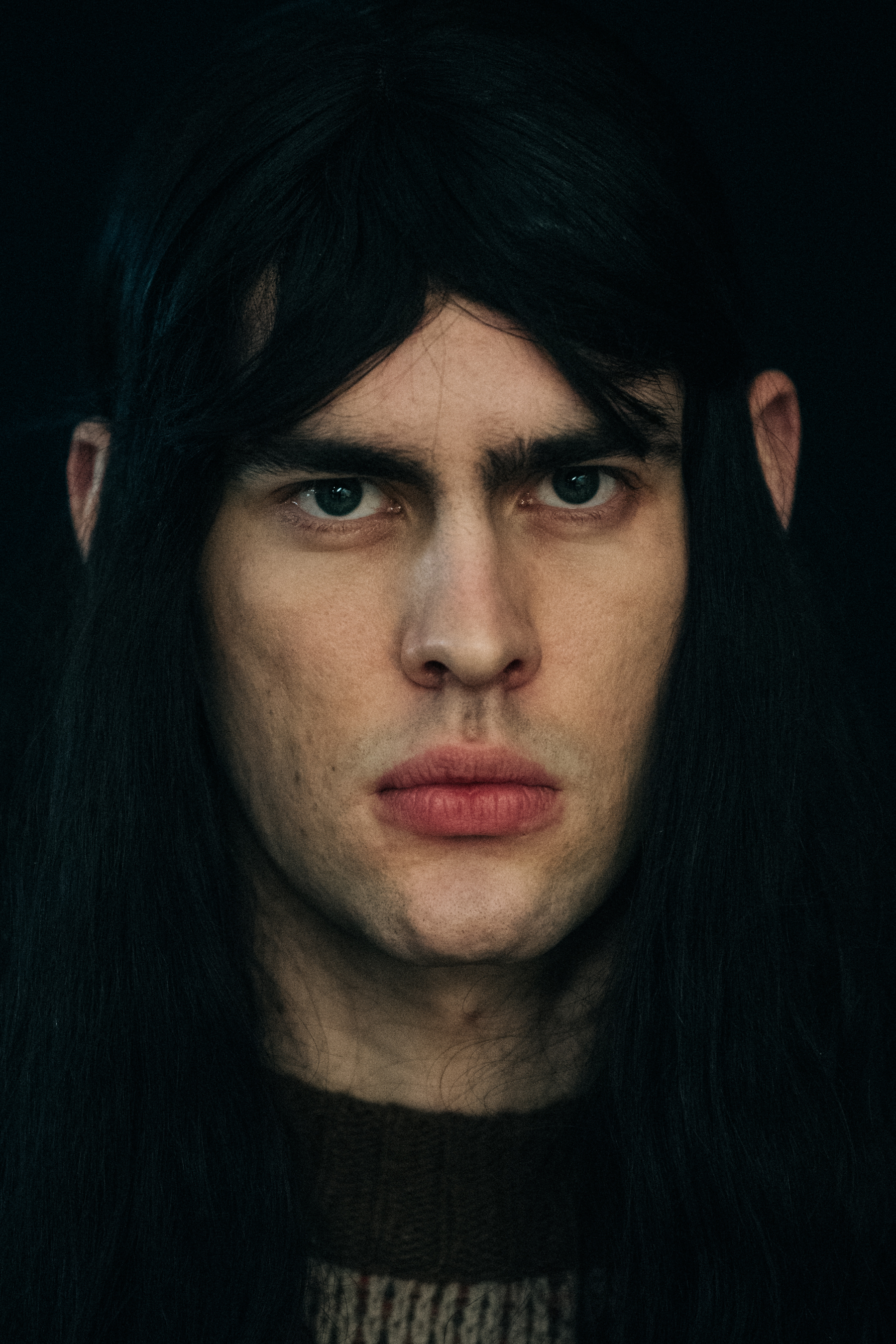 Portrait of model with long dark hair