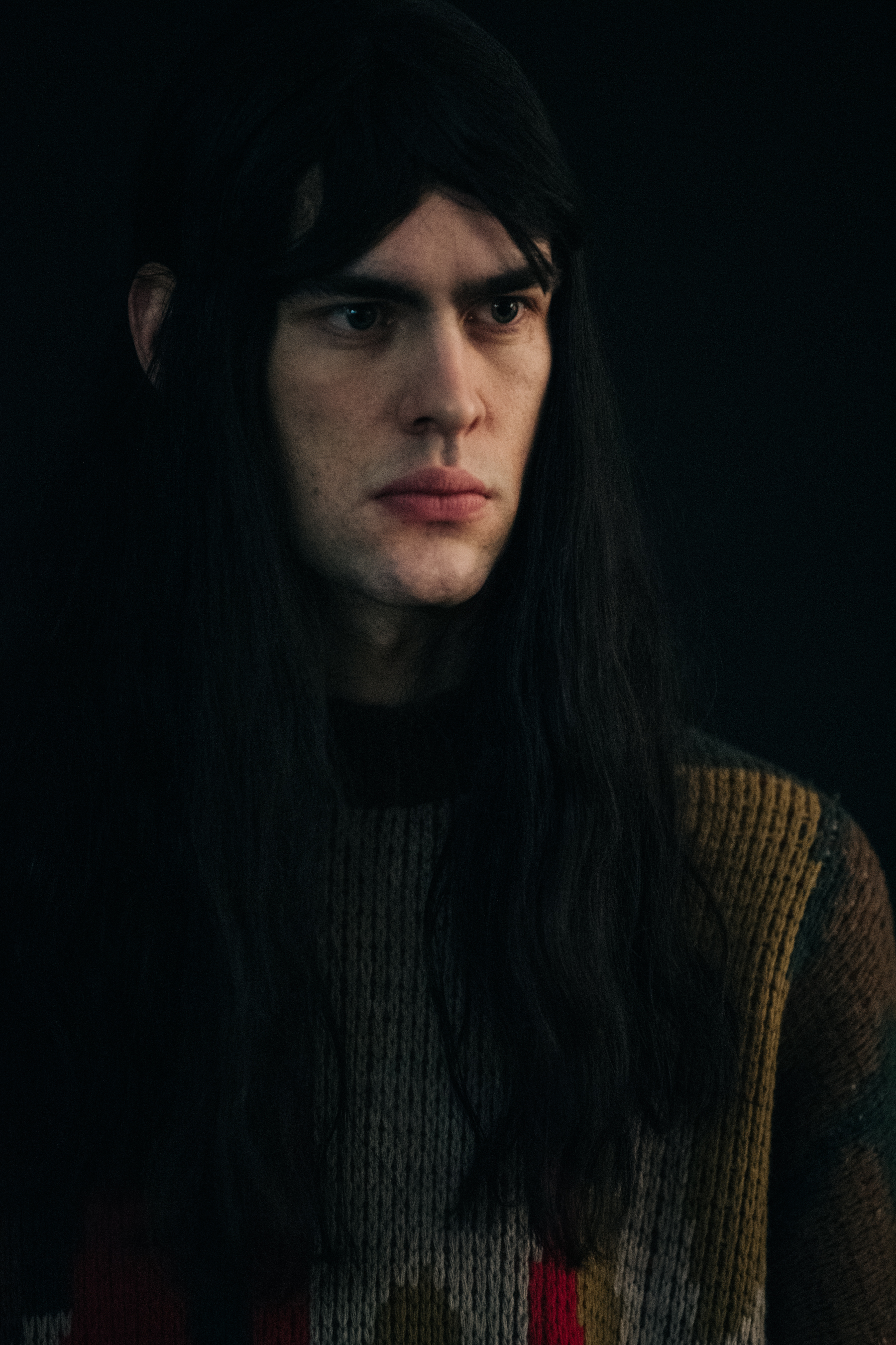 Model wearing wool jumper backstage