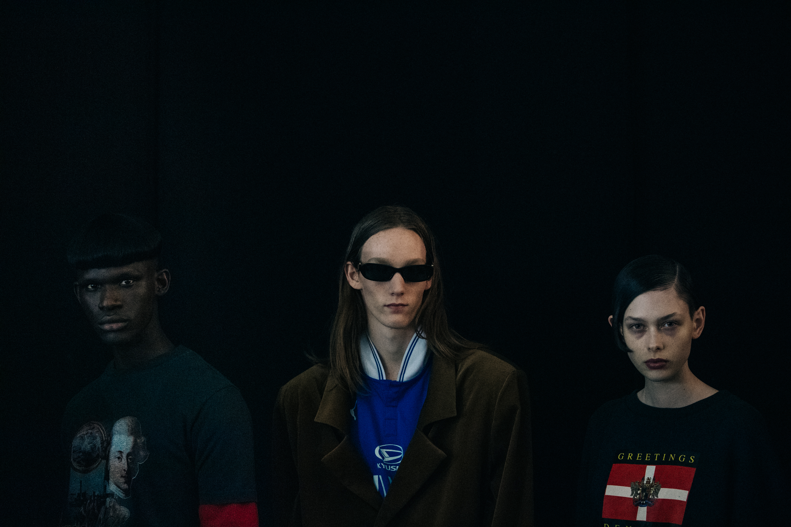 Model wearing red and blue backstage