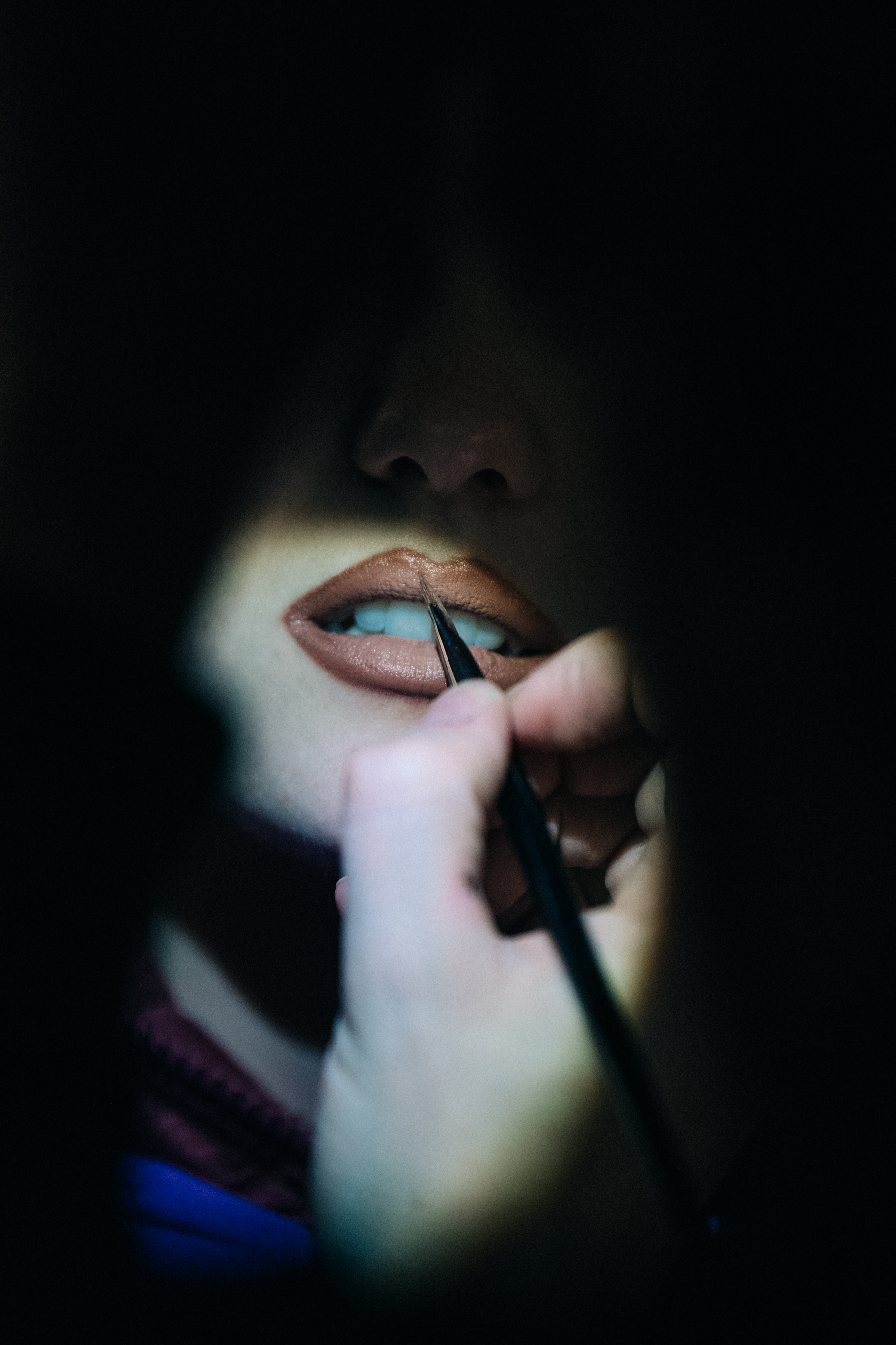 Model in hair and makeup backstage