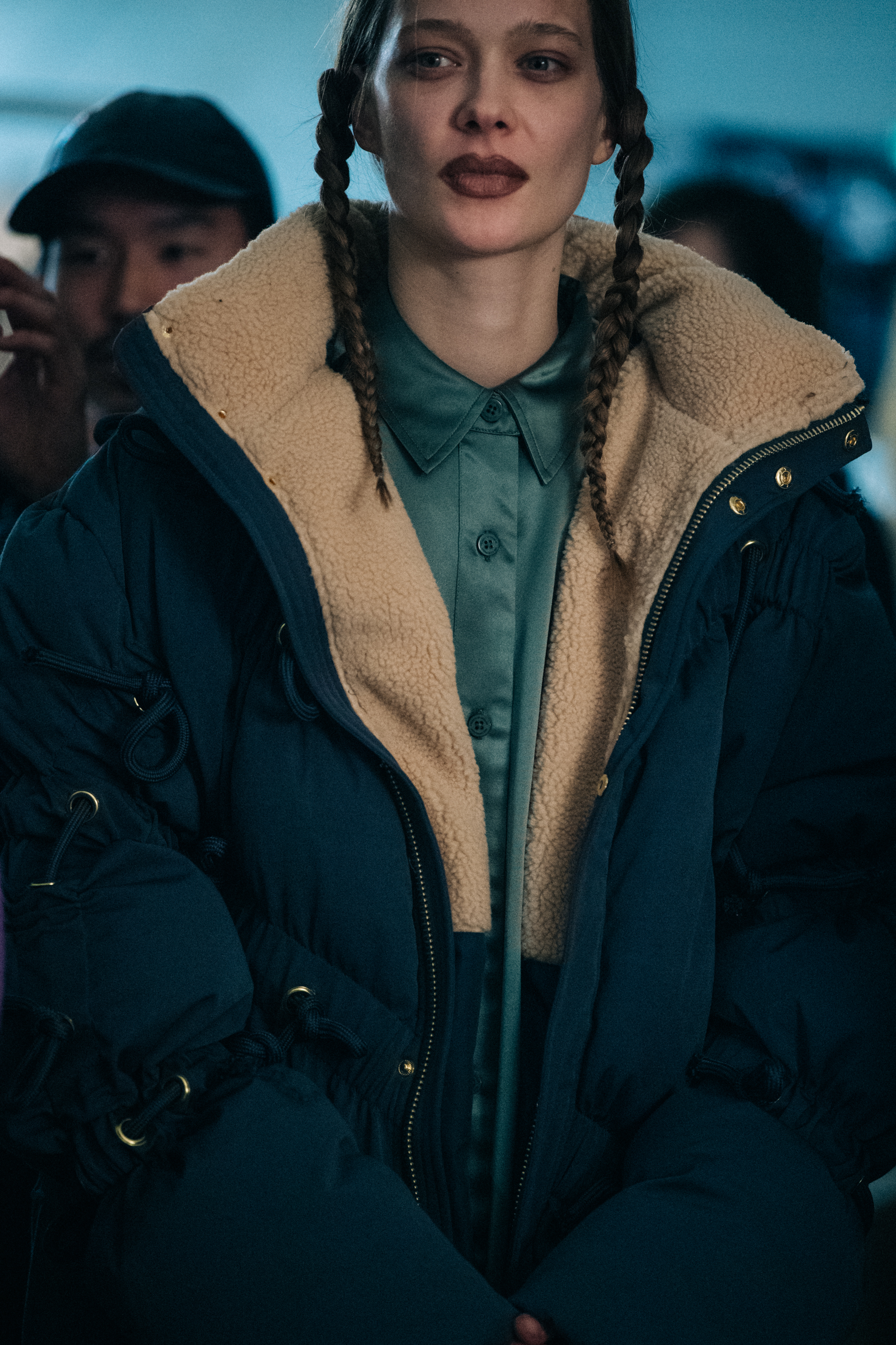 Model wearing coat at Han Kjøbenhavn